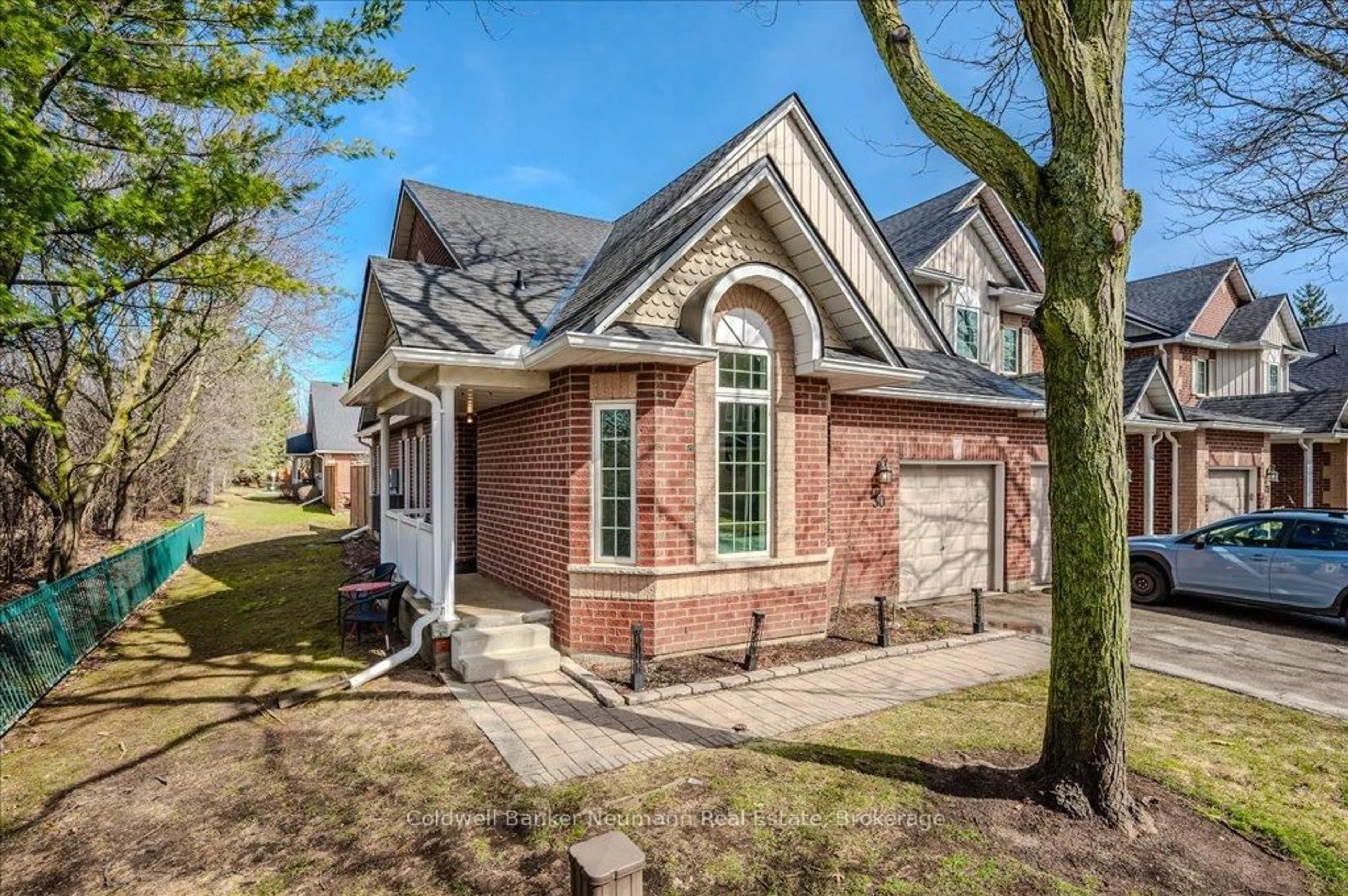 Home with brick exterior material, street for 60 Ptarmigan Dr #30, Guelph Ontario N1C 1E5