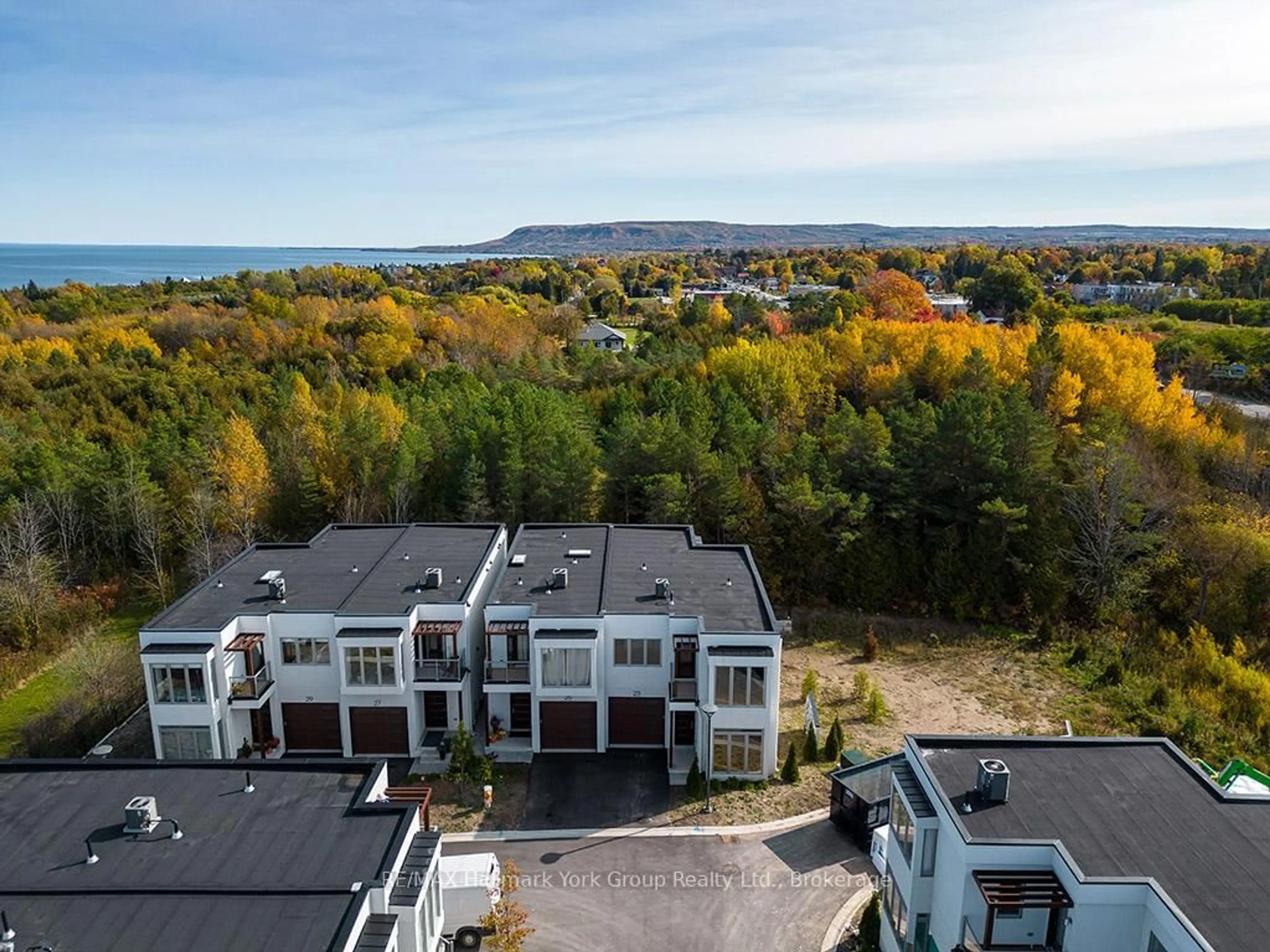 A pic from outside/outdoor area/front of a property/back of a property/a pic from drone, water/lake/river/ocean view for 23 Waterview Lane, Blue Mountains Ontario N0H 2P0