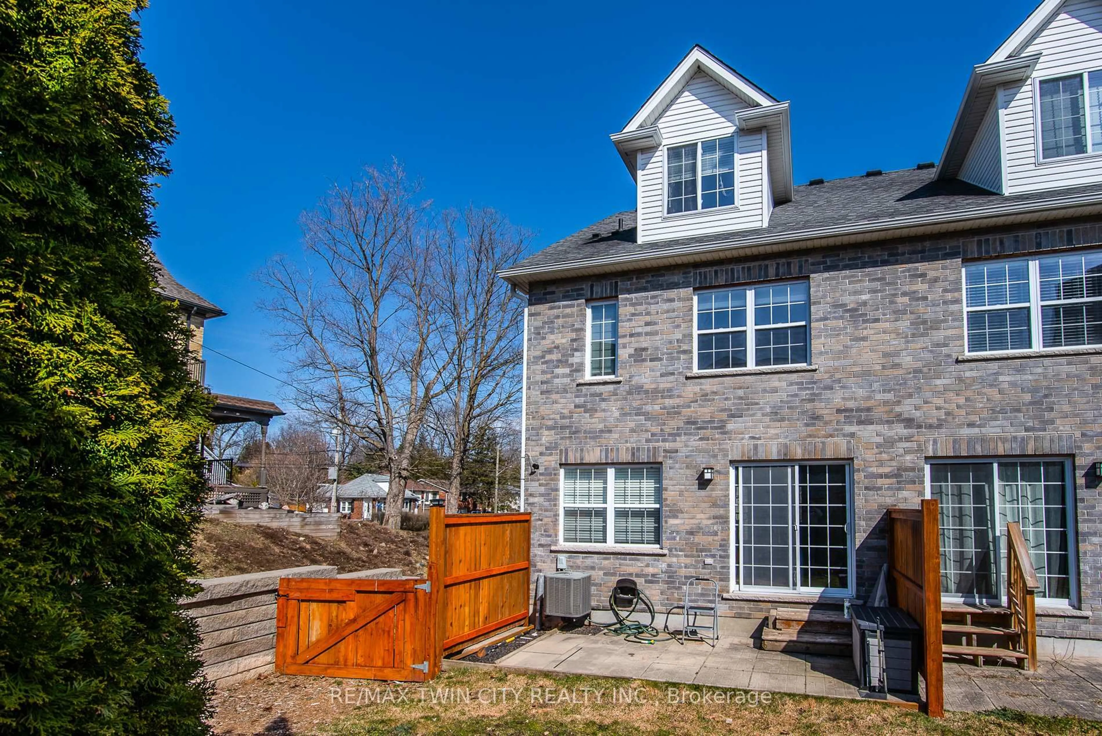 Home with brick exterior material, street for 45 Woolwich St, Kitchener Ontario N2K 1S2