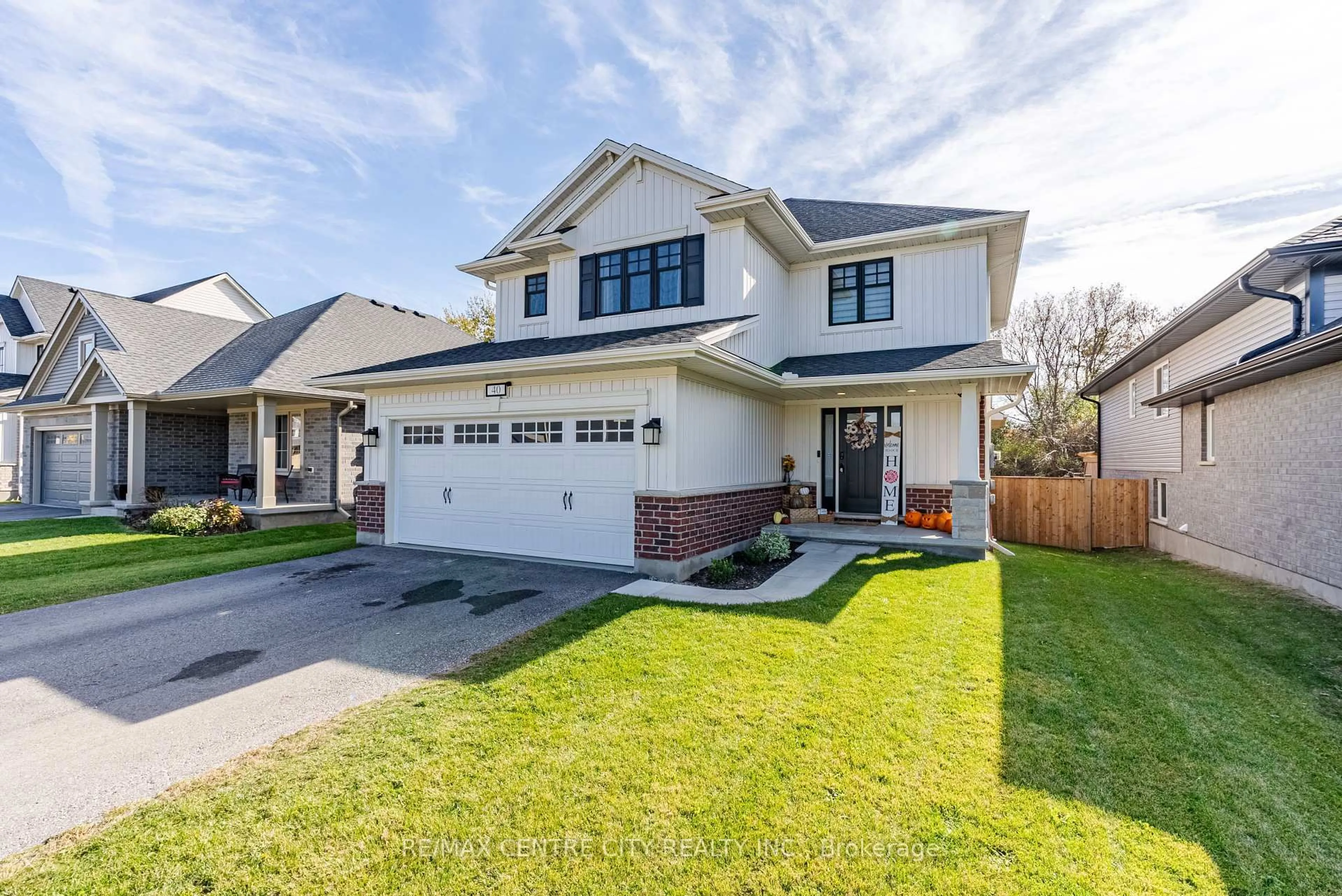 Home with brick exterior material, street for 40 Livingstone Dr, Tillsonburg Ontario N4G 0J3