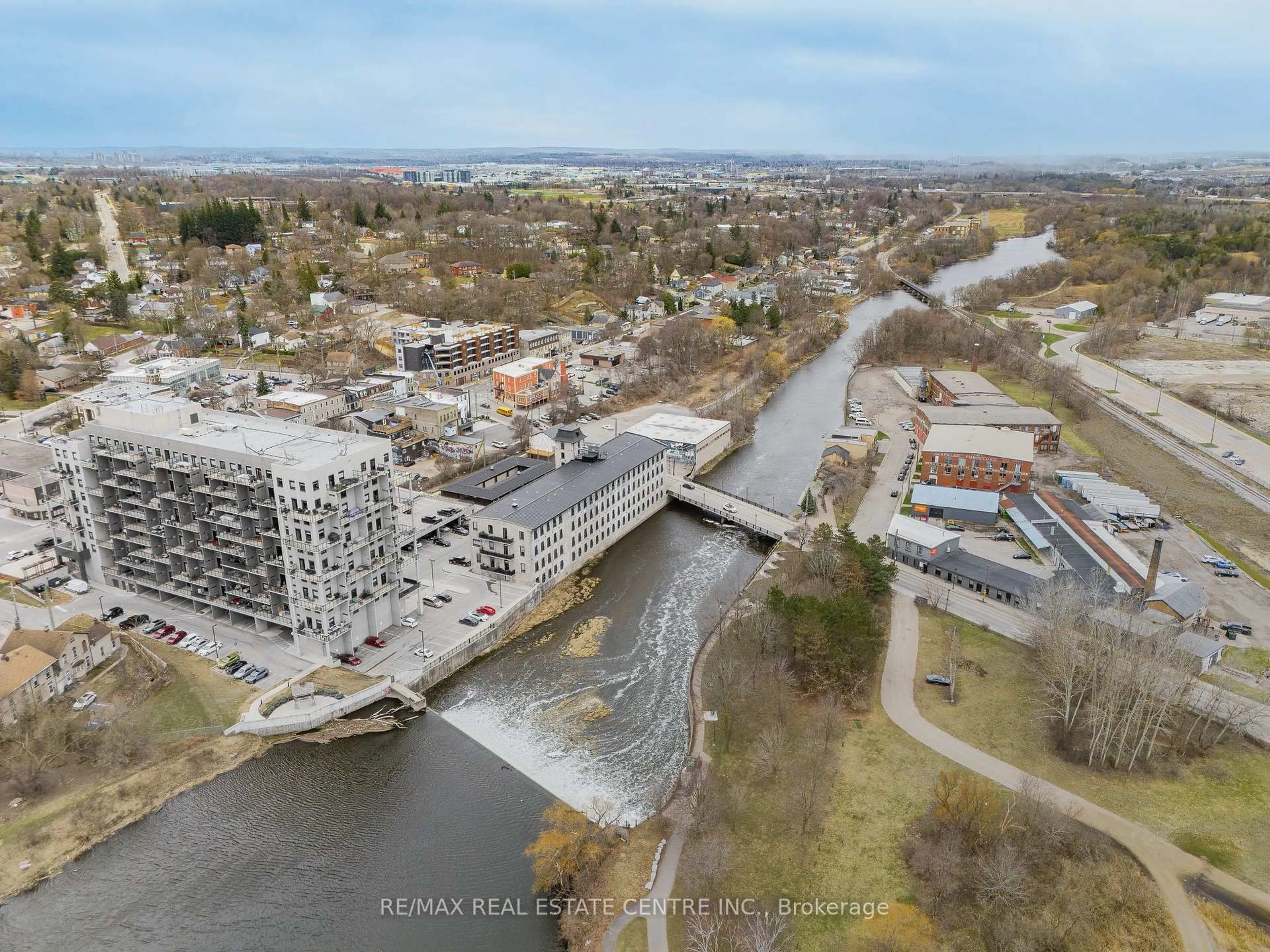 A pic from outside/outdoor area/front of a property/back of a property/a pic from drone, water/lake/river/ocean view for 19 Guelph Ave #204, Cambridge Ontario N3C 1A2