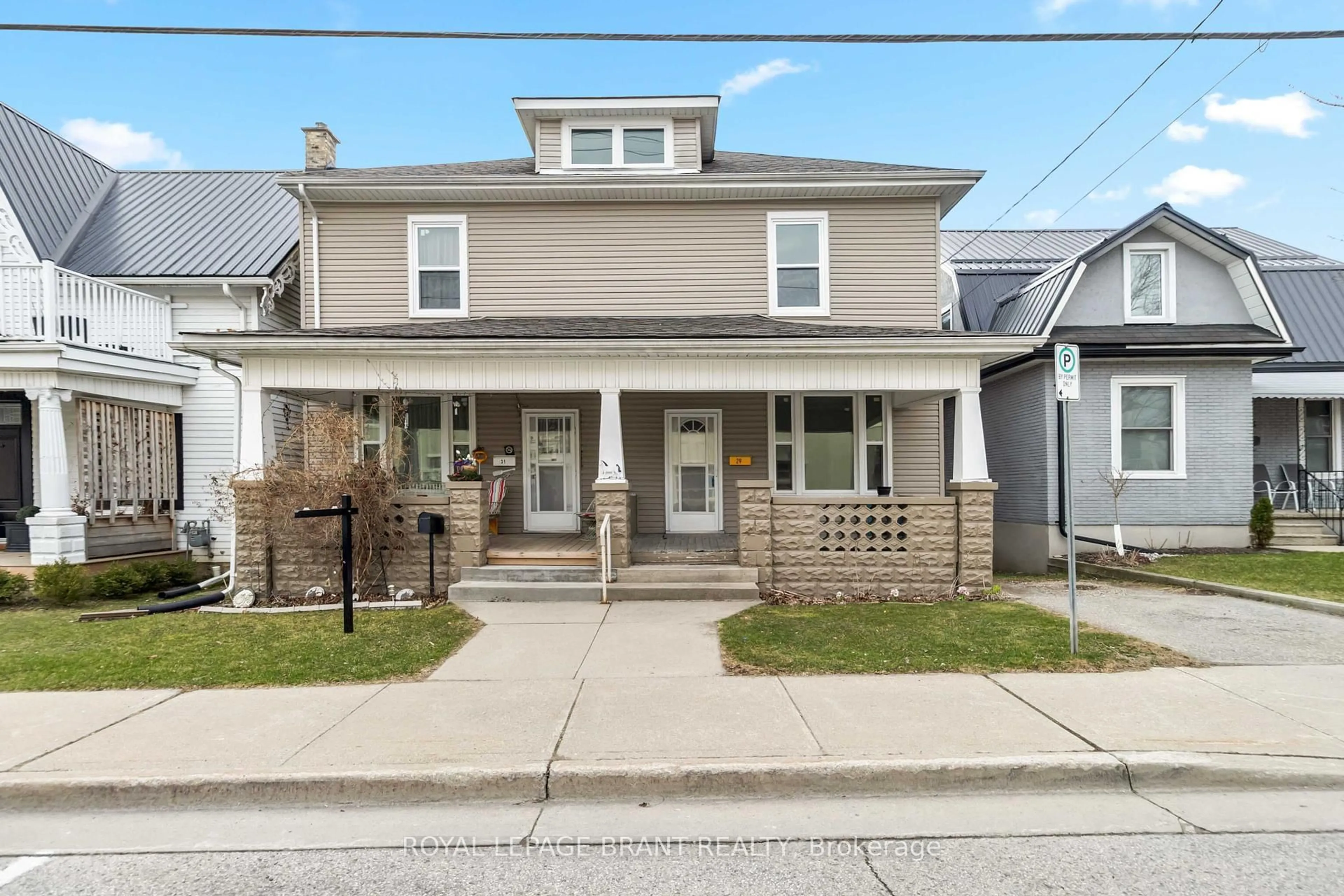 Home with vinyl exterior material, street for 29/31 London St, Tillsonburg Ontario N4G 2K9
