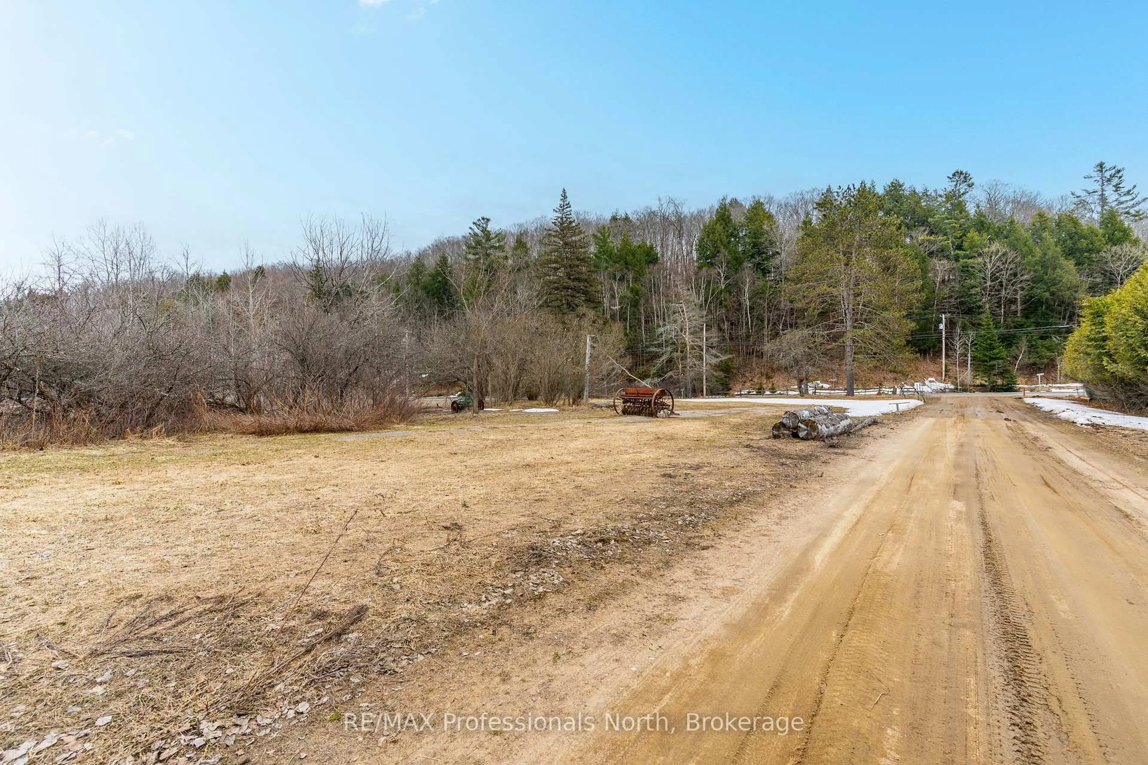 A pic from outside/outdoor area/front of a property/back of a property/a pic from drone, forest/trees view for 1010 Sturgeon Dr, Minden Hills Ontario K0M 2K0