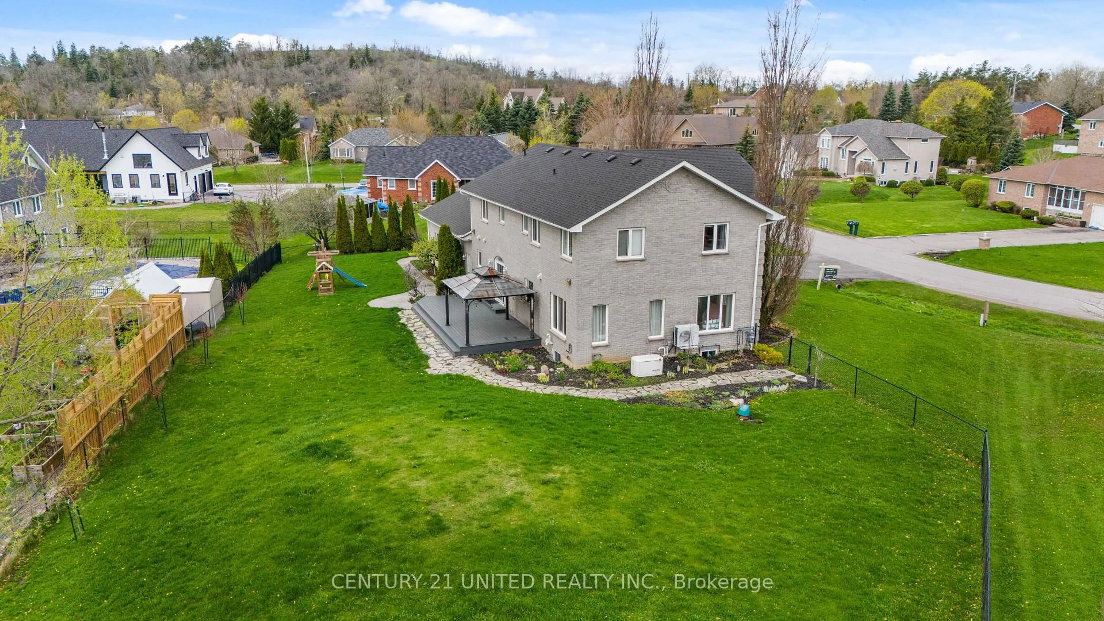 A pic from outside/outdoor area/front of a property/back of a property/a pic from drone, unknown for 550 Naish Dr, Peterborough East Ontario K9H 0E4