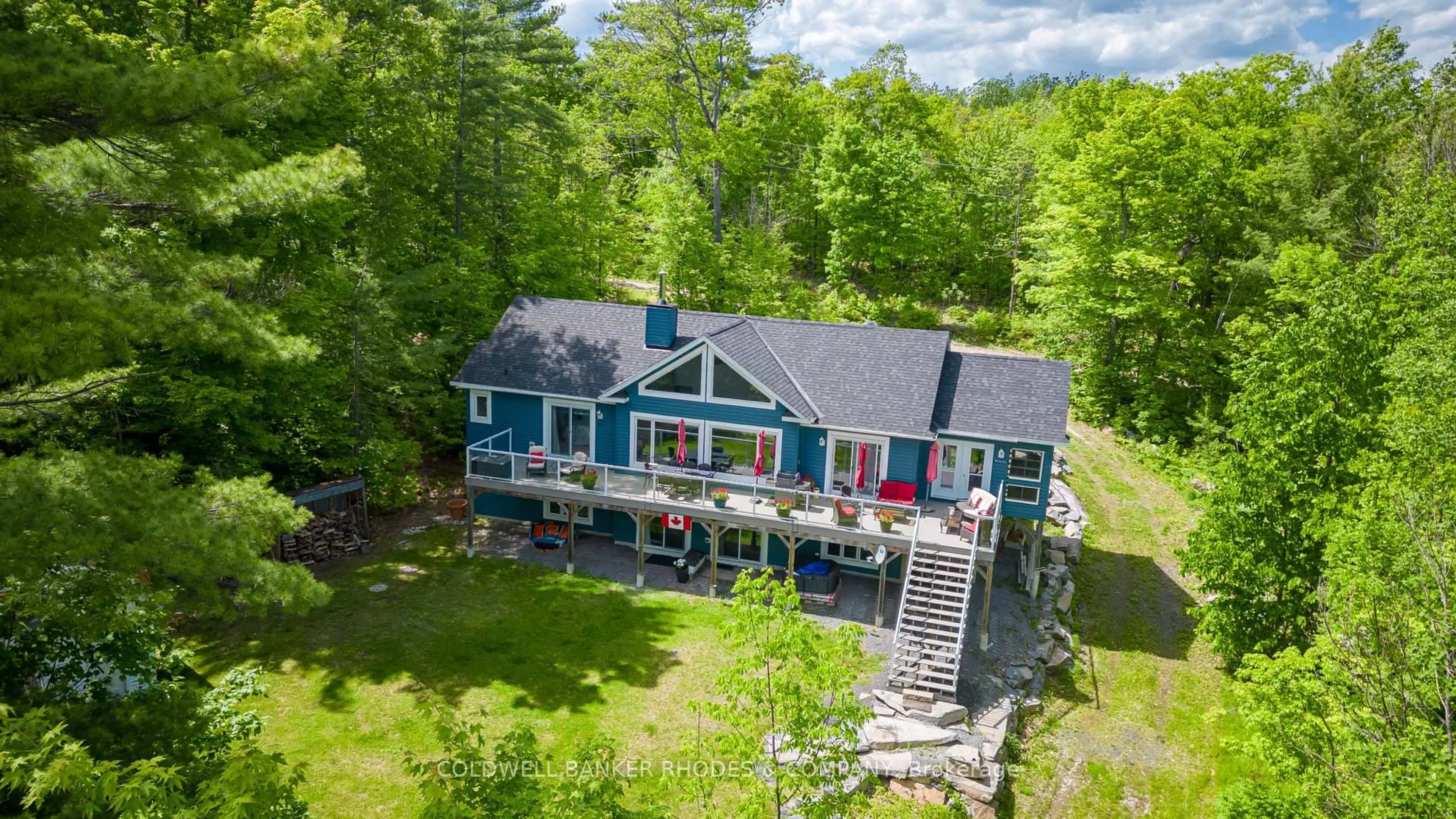 A pic from outside/outdoor area/front of a property/back of a property/a pic from drone, water/lake/river/ocean view for 1045 WABALAC Rd, Lanark Ontario K0G 1K0