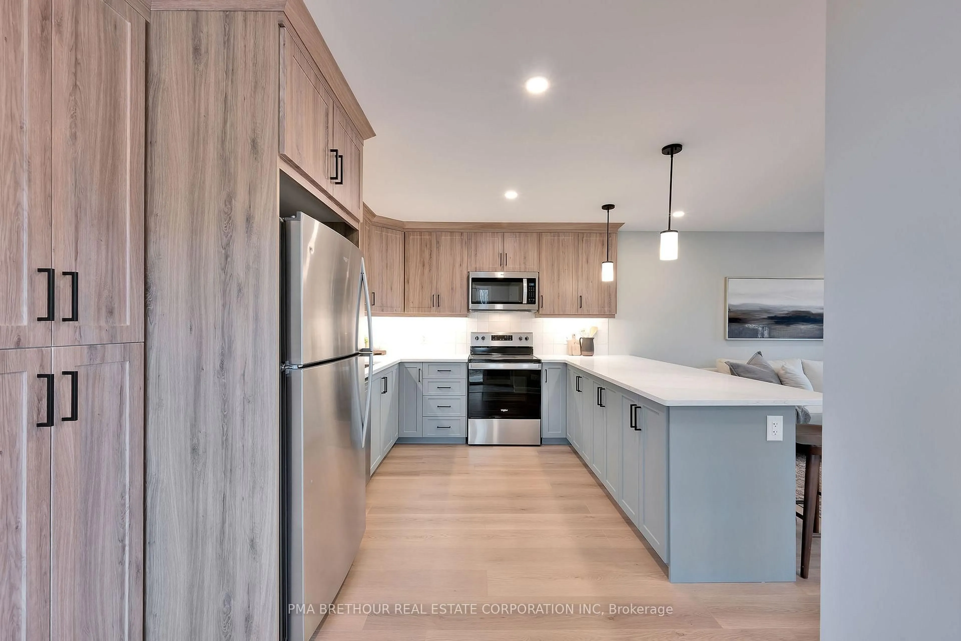 Open concept kitchen, wood/laminate floor for 144 Doctor Agnes Craine Dr, Smiths Falls Ontario K7A 0A5