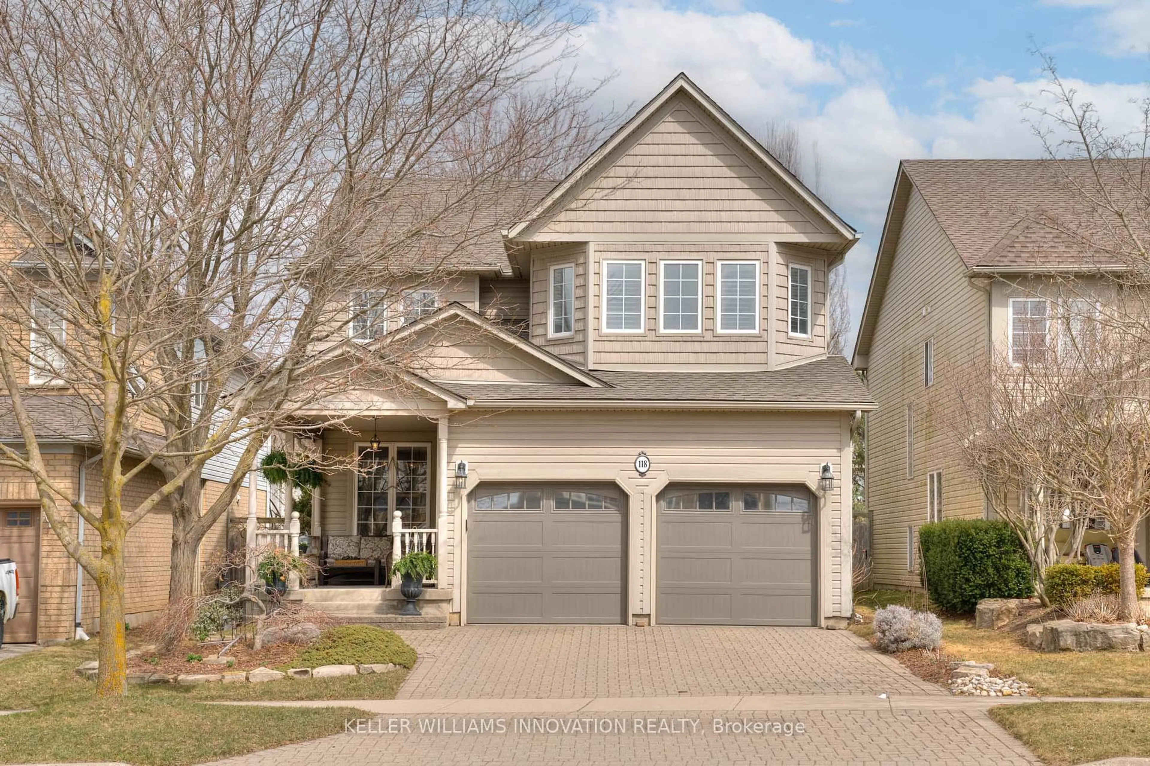 Home with brick exterior material, street for 118 Autumn Ridge Tr, Kitchener Ontario N2P 2K1