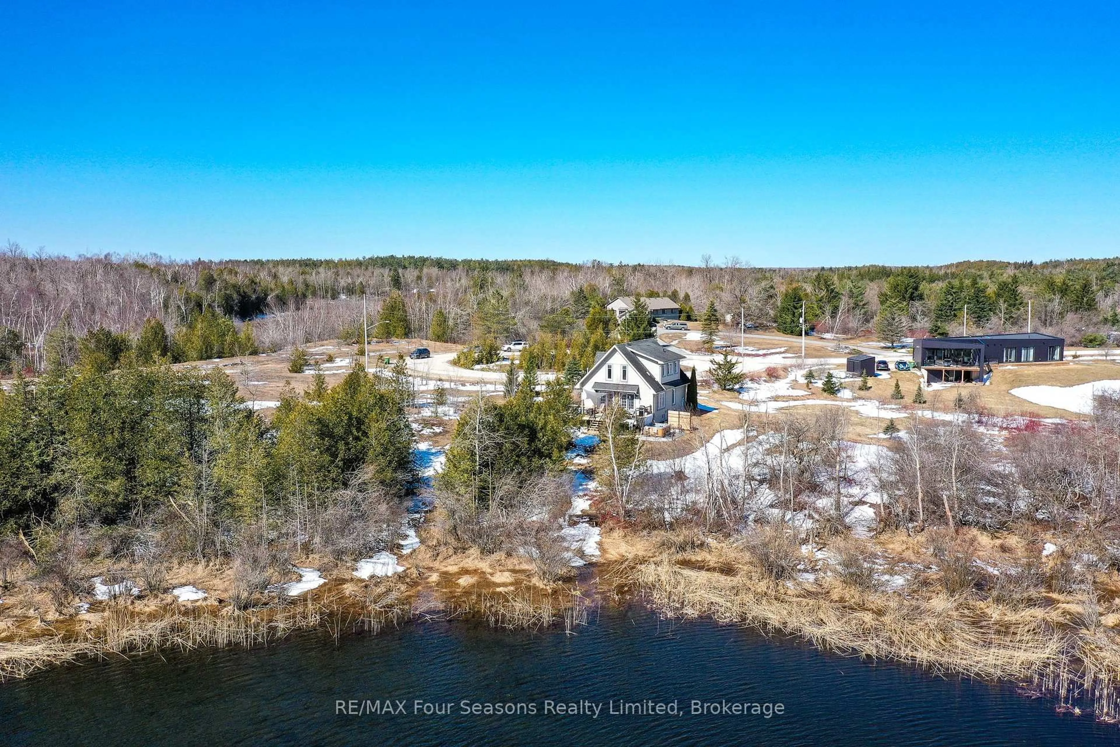 A pic from outside/outdoor area/front of a property/back of a property/a pic from drone, water/lake/river/ocean view for 139 Young Dr, Grey Highlands Ontario N0C 1M0