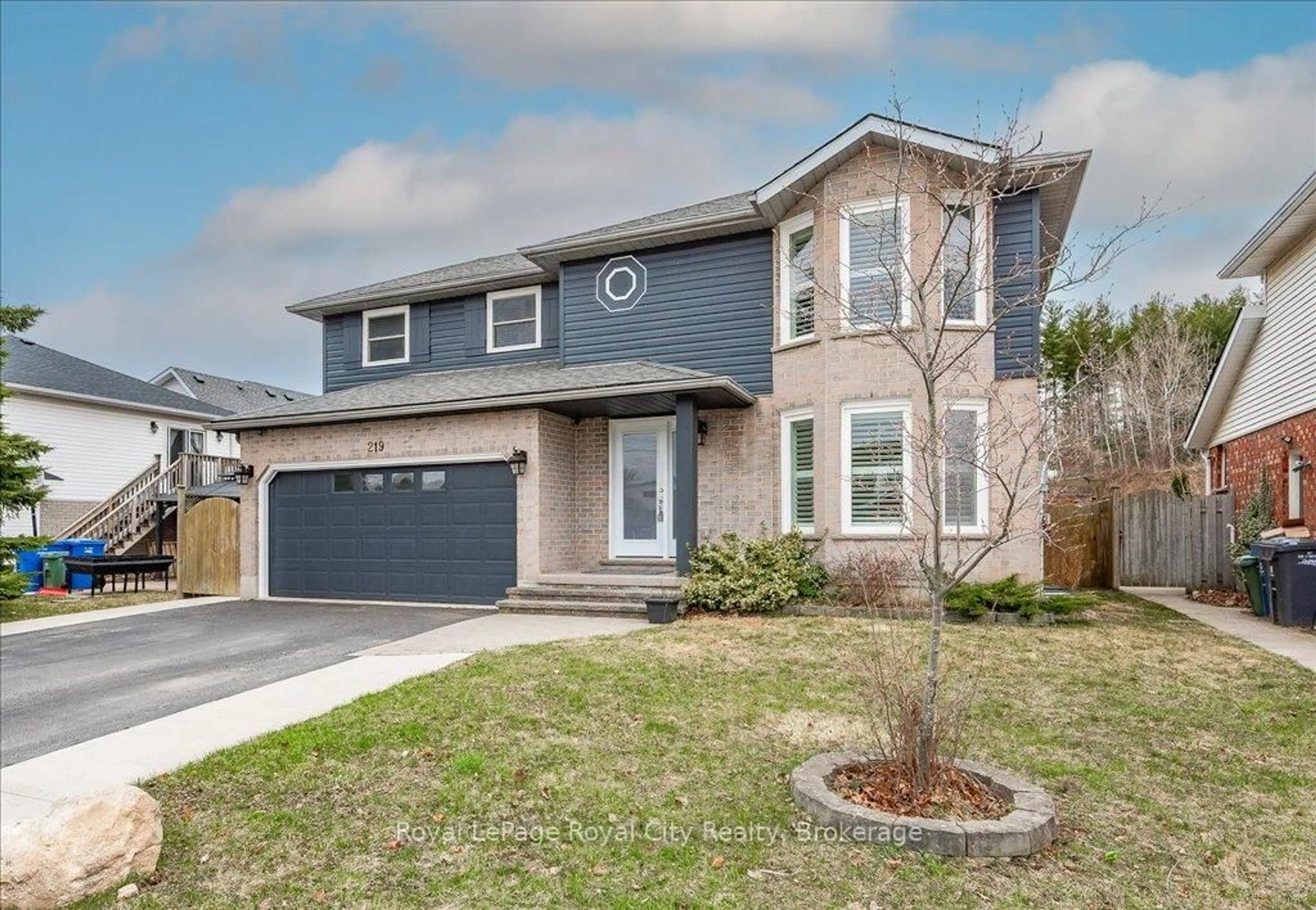 Home with brick exterior material, street for 219 Elmira Rd, Guelph Ontario N1K 1R1