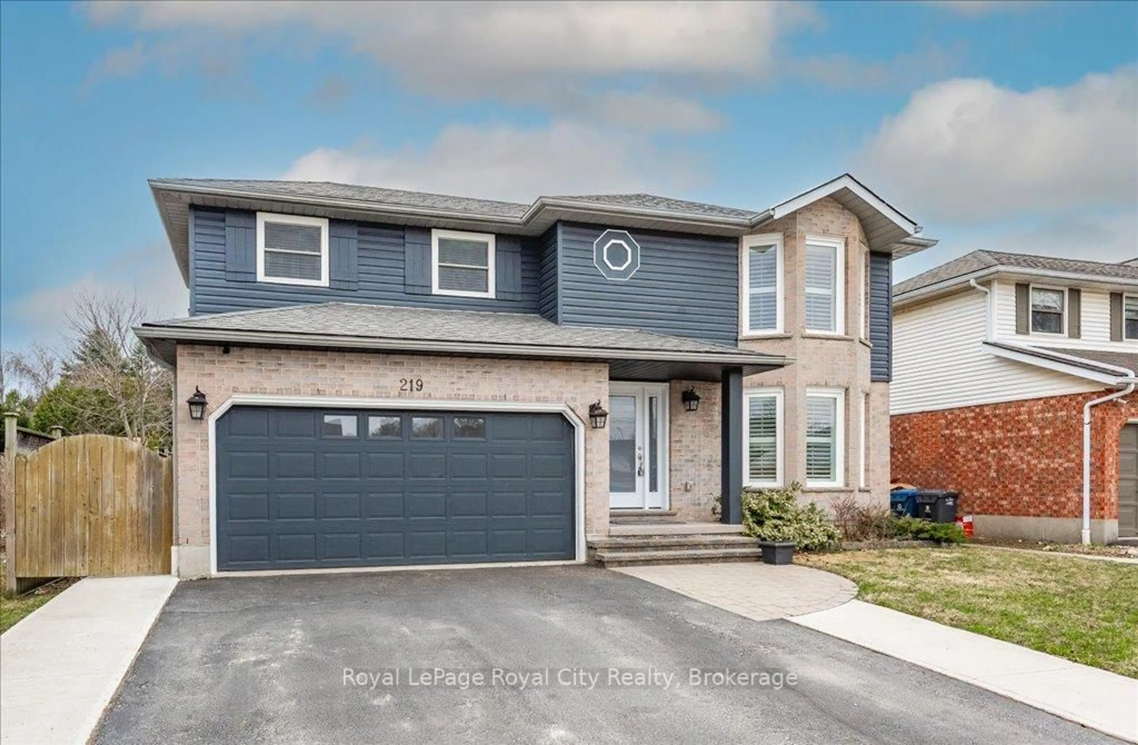 Home with brick exterior material, street for 219 Elmira Rd, Guelph Ontario N1K 1R1