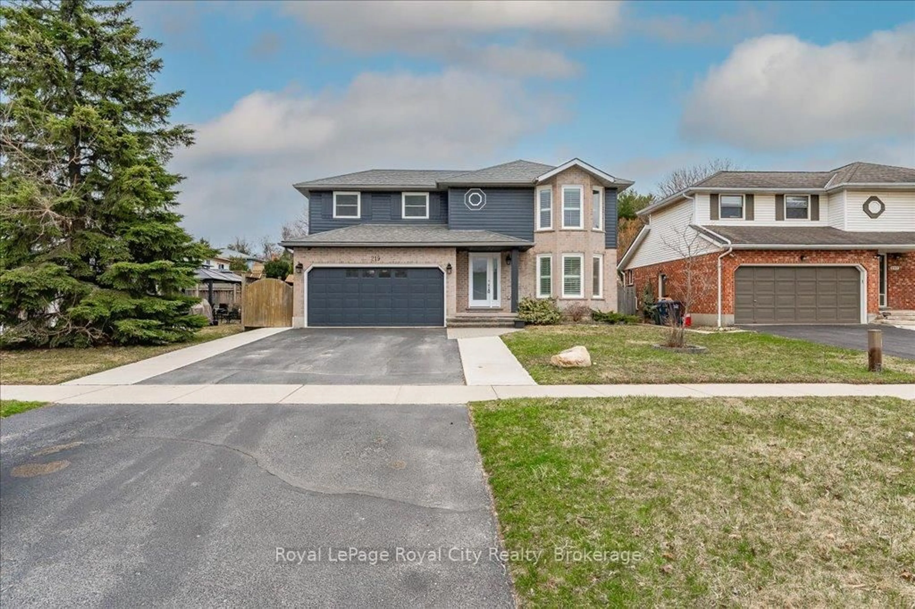 Home with brick exterior material, street for 219 Elmira Rd, Guelph Ontario N1K 1R1