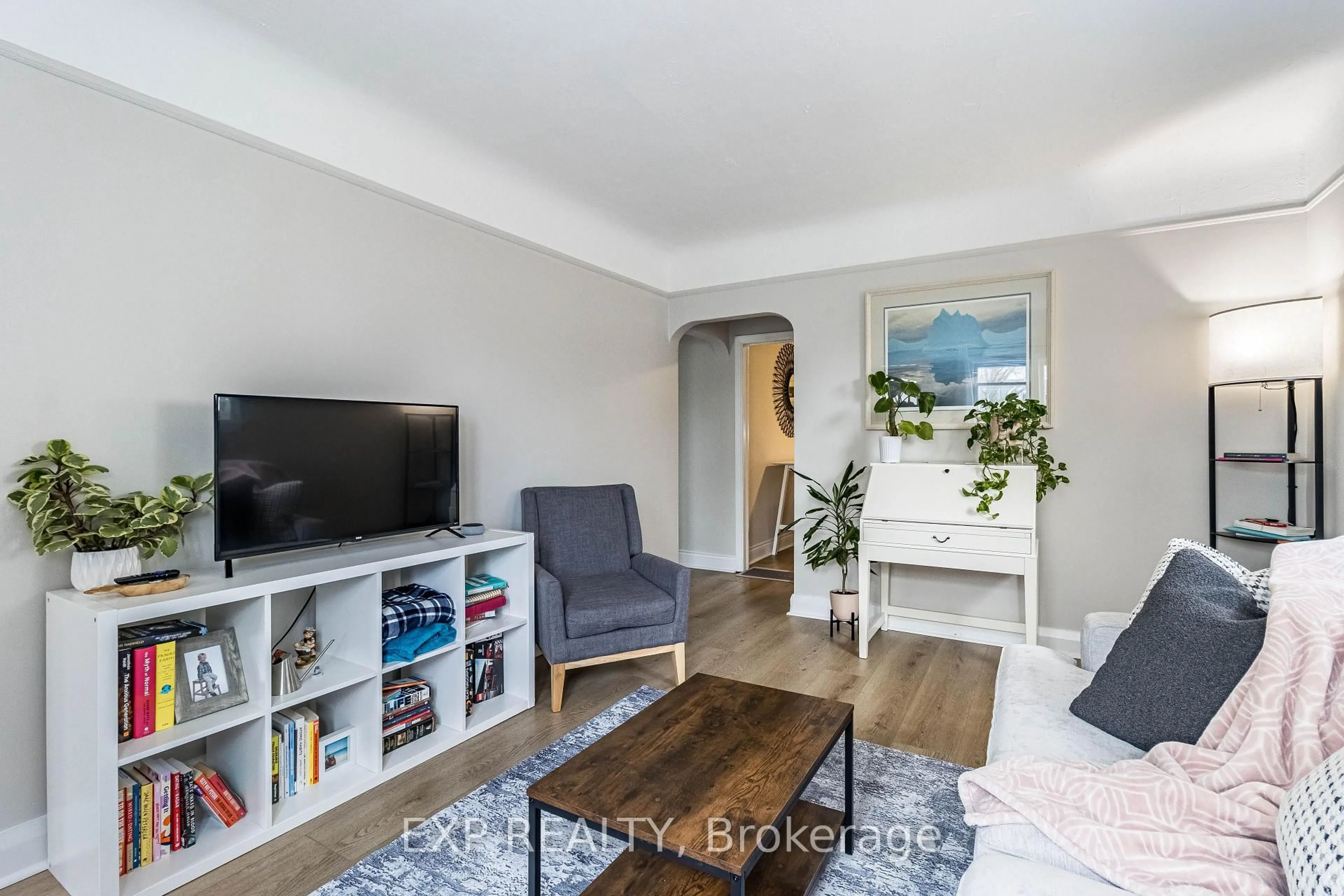 Living room with furniture, wood/laminate floor for 61 Hamel Ave, Kitchener Ontario N2K 1M7