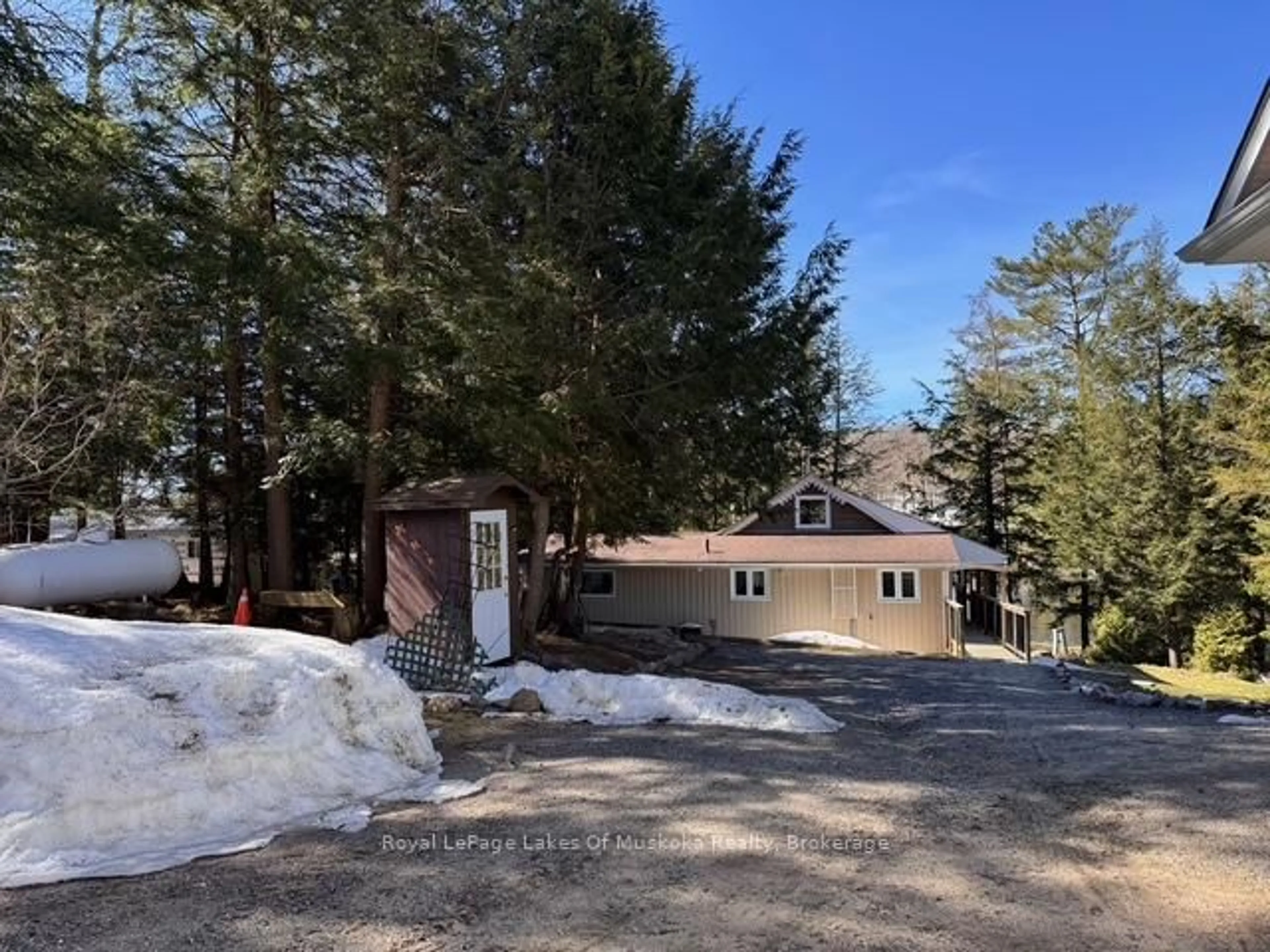 A pic from outside/outdoor area/front of a property/back of a property/a pic from drone, mountain view for 1019 Lakeshore Rd, Bracebridge Ontario P1L 1X3