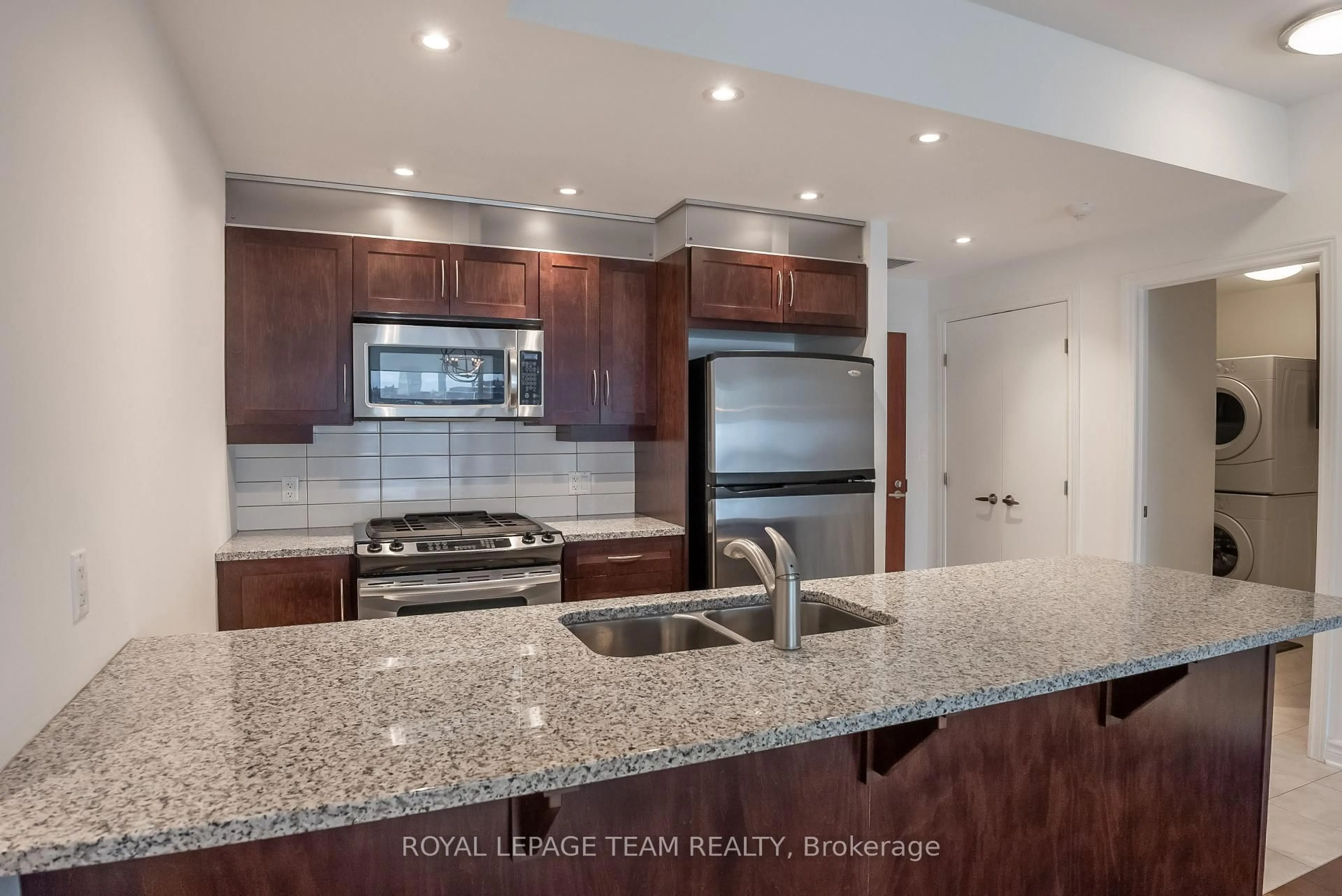 Open concept kitchen, ceramic/tile floor for 575 Byron Ave #609, Ottawa Ontario K2A 1R7