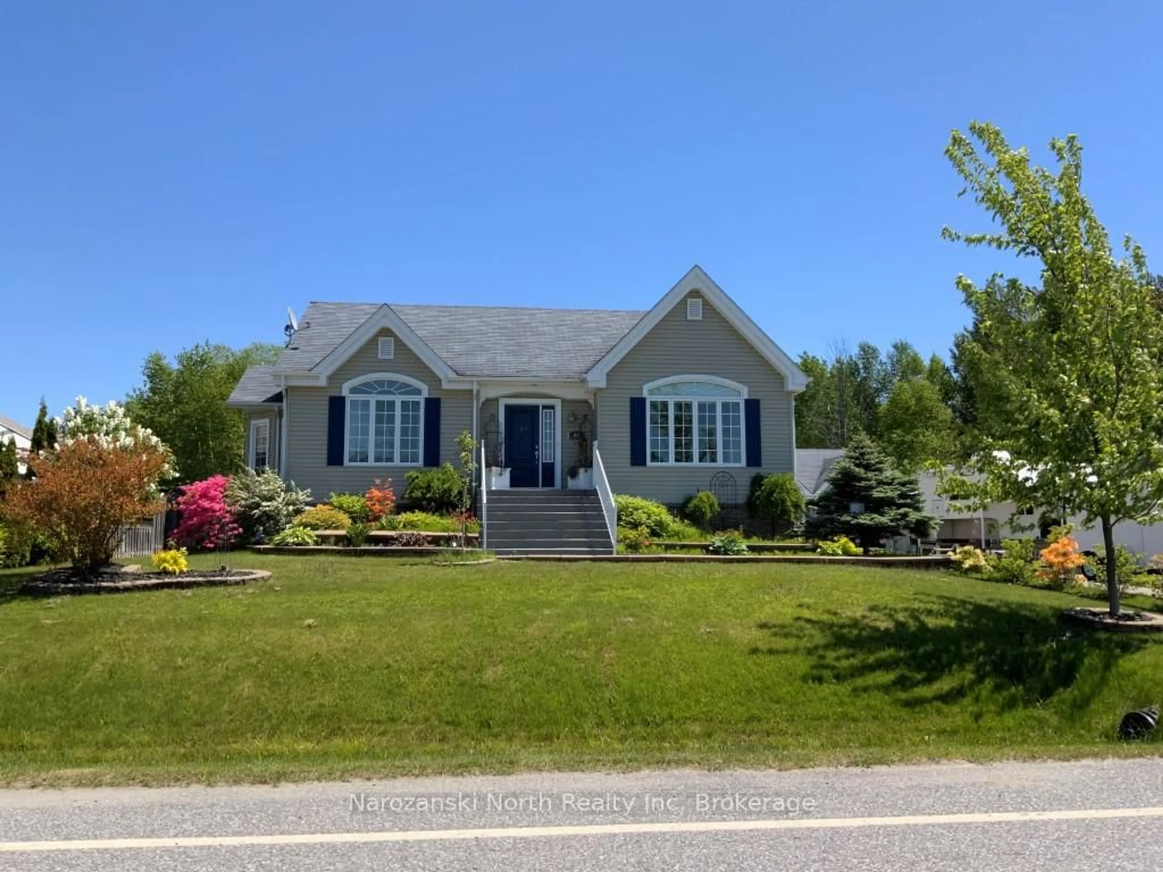 Home with vinyl exterior material, street for 46 Tamerack Ave, West Nipissing Ontario P2B 3H3