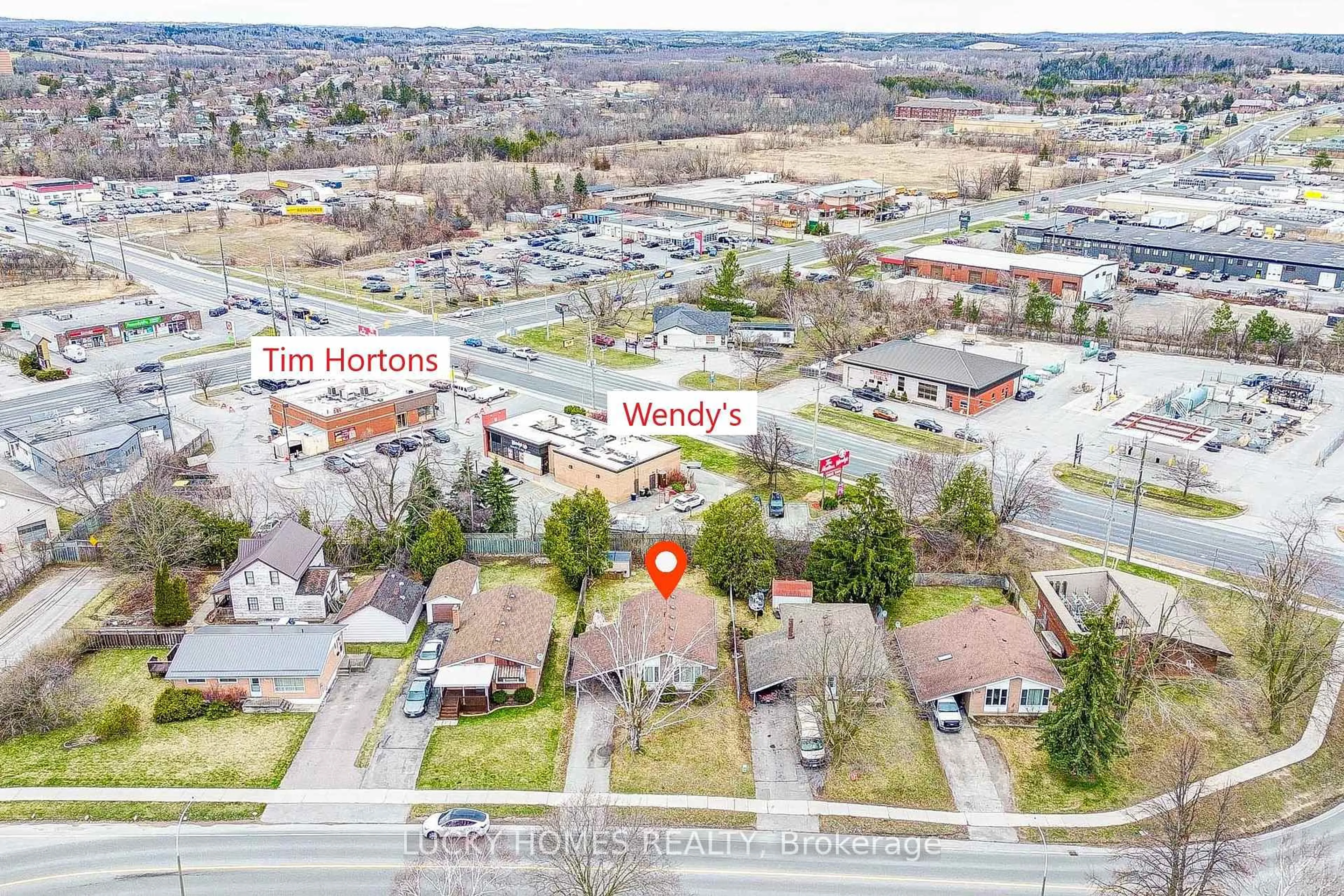 A pic from outside/outdoor area/front of a property/back of a property/a pic from drone, unknown for 711 Otonabee Dr, Peterborough South Ontario K9J 7P8