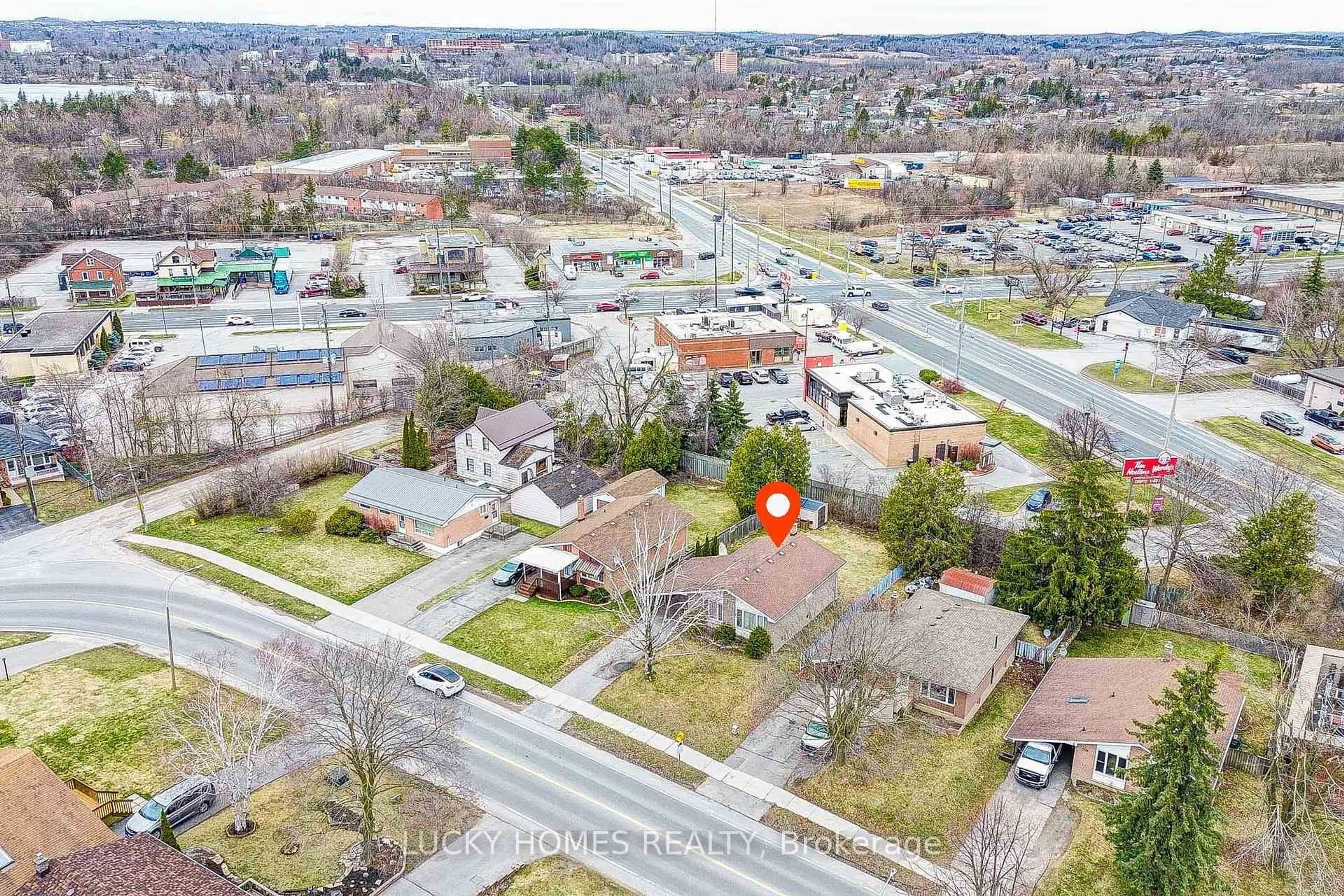 A pic from outside/outdoor area/front of a property/back of a property/a pic from drone, street for 711 Otonabee Dr, Peterborough South Ontario K9J 7P8