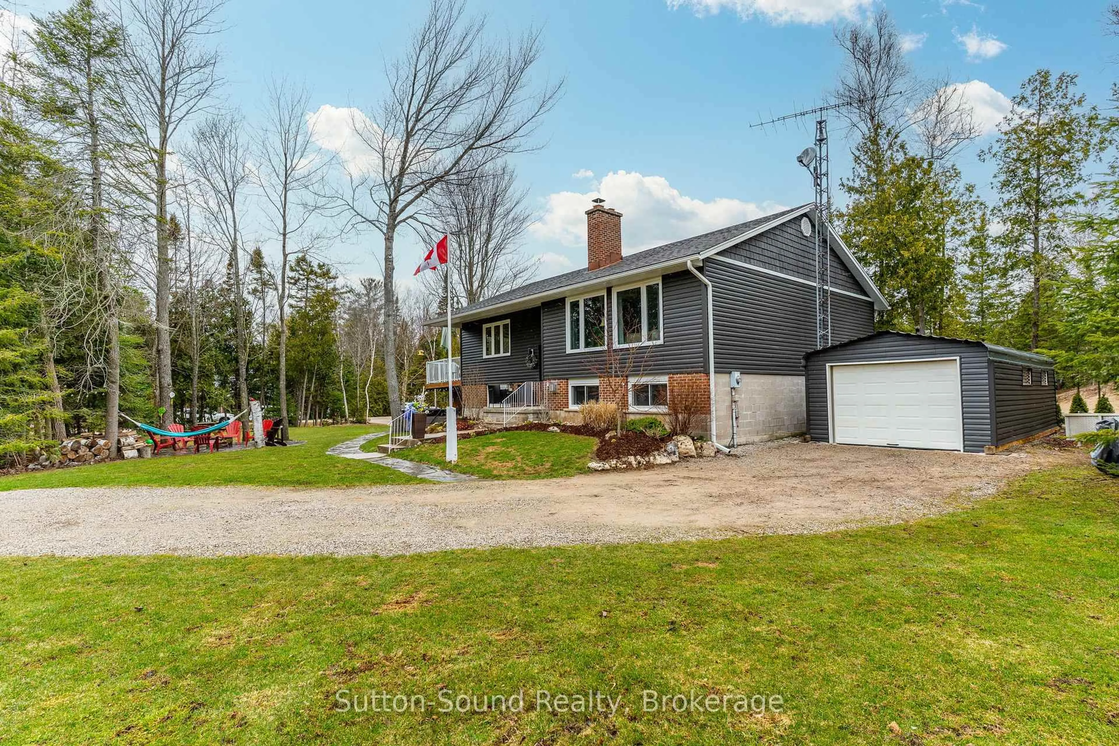 A pic from outside/outdoor area/front of a property/back of a property/a pic from drone, street for 403 Simcoe Ave, South Bruce Peninsula Ontario N0H 2G0