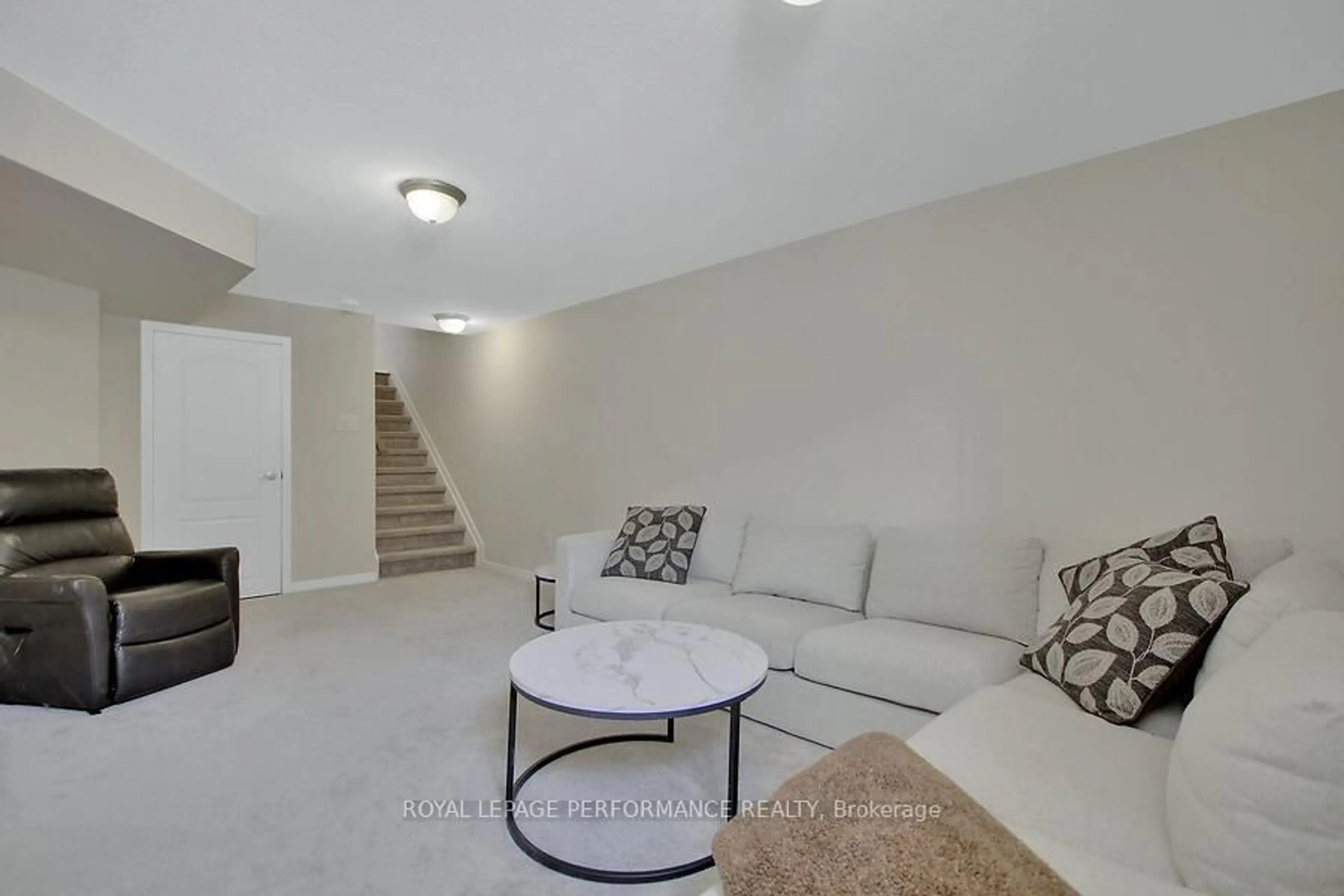 Living room with furniture, unknown for 202 Don Brown Private N/A, Ottawa Ontario K2M 0A6