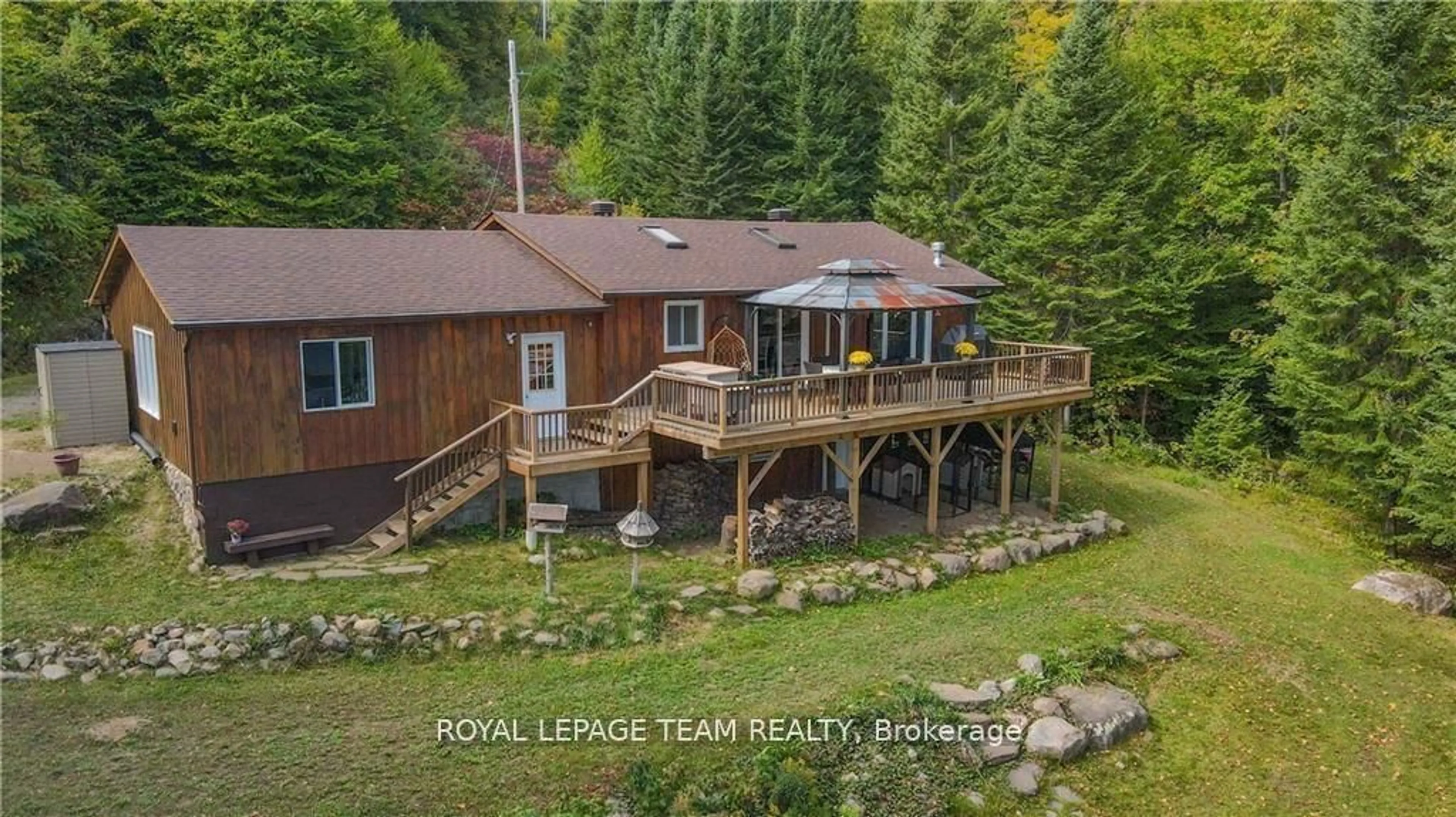 A pic from outside/outdoor area/front of a property/back of a property/a pic from drone, water/lake/river/ocean view for 737D Mitchell Rd, Barry's Bay Ontario K0J 1B0