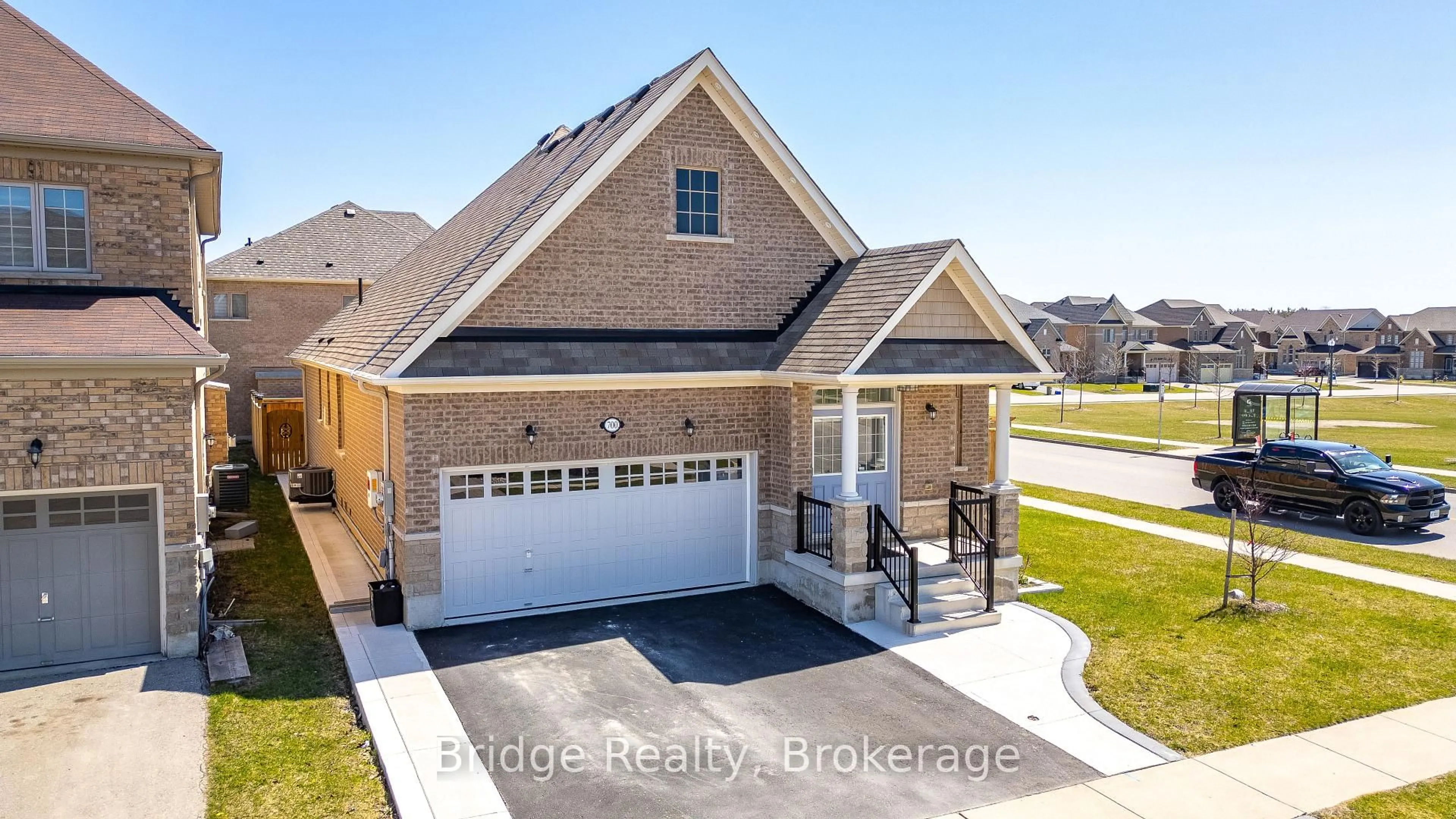 Home with brick exterior material, street for 700 Arthur Parker Ave, Woodstock Ontario N4S 7W2