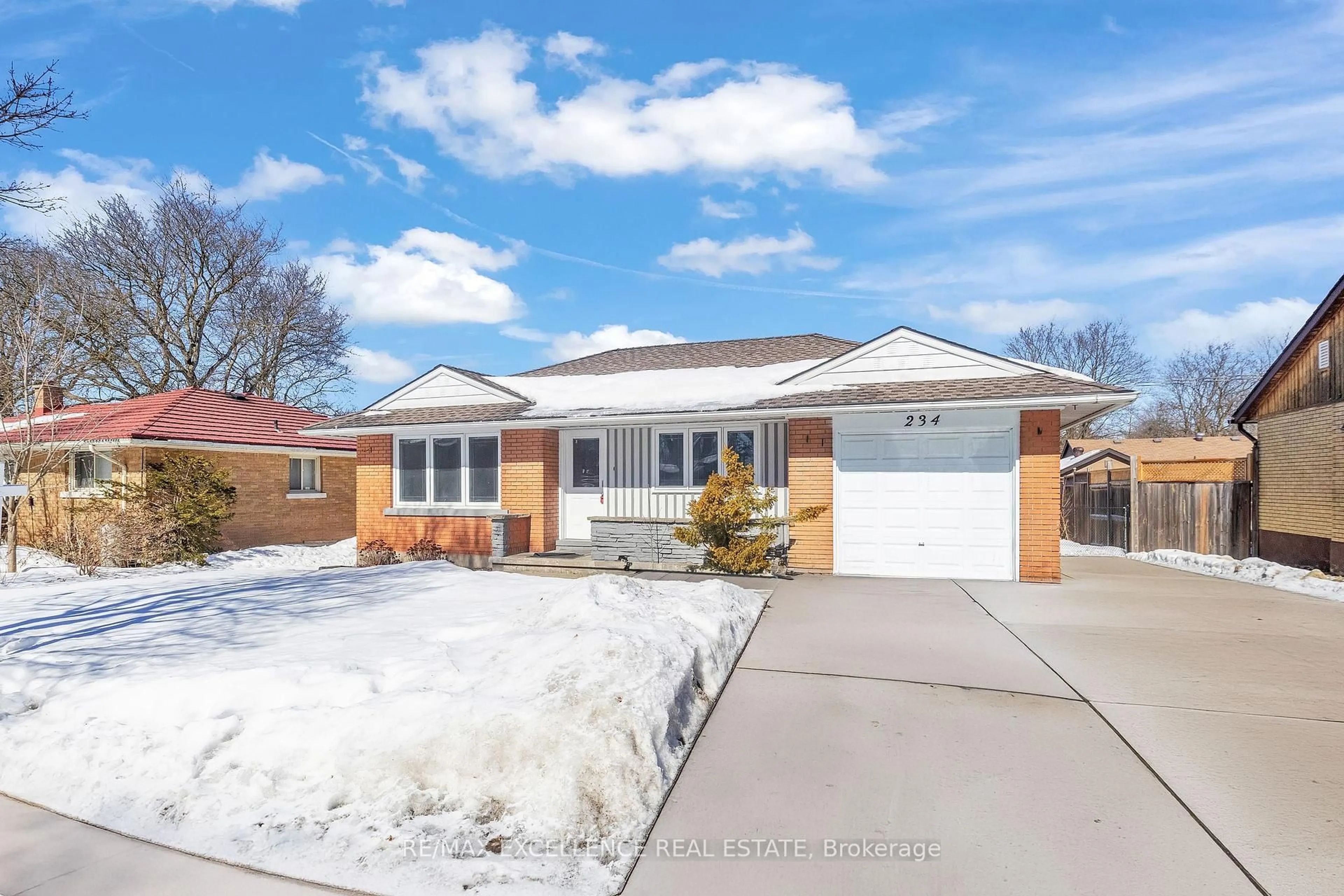 Home with brick exterior material, street for 234 Erb St, Waterloo Ontario N2J 1M8