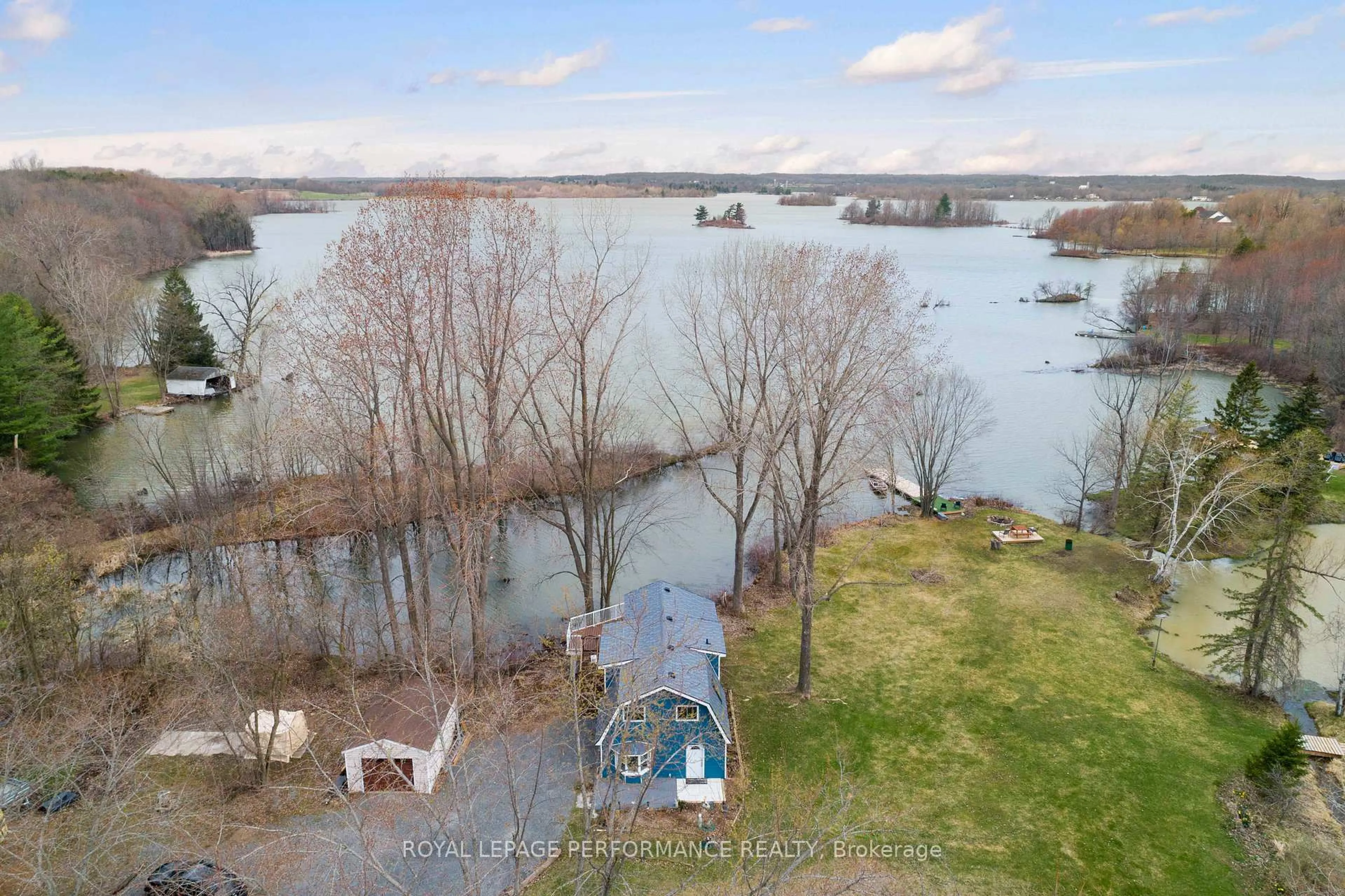 A pic from outside/outdoor area/front of a property/back of a property/a pic from drone, water/lake/river/ocean view for 1930 Sunbury Rd, Inverary Ontario K0H 1X0