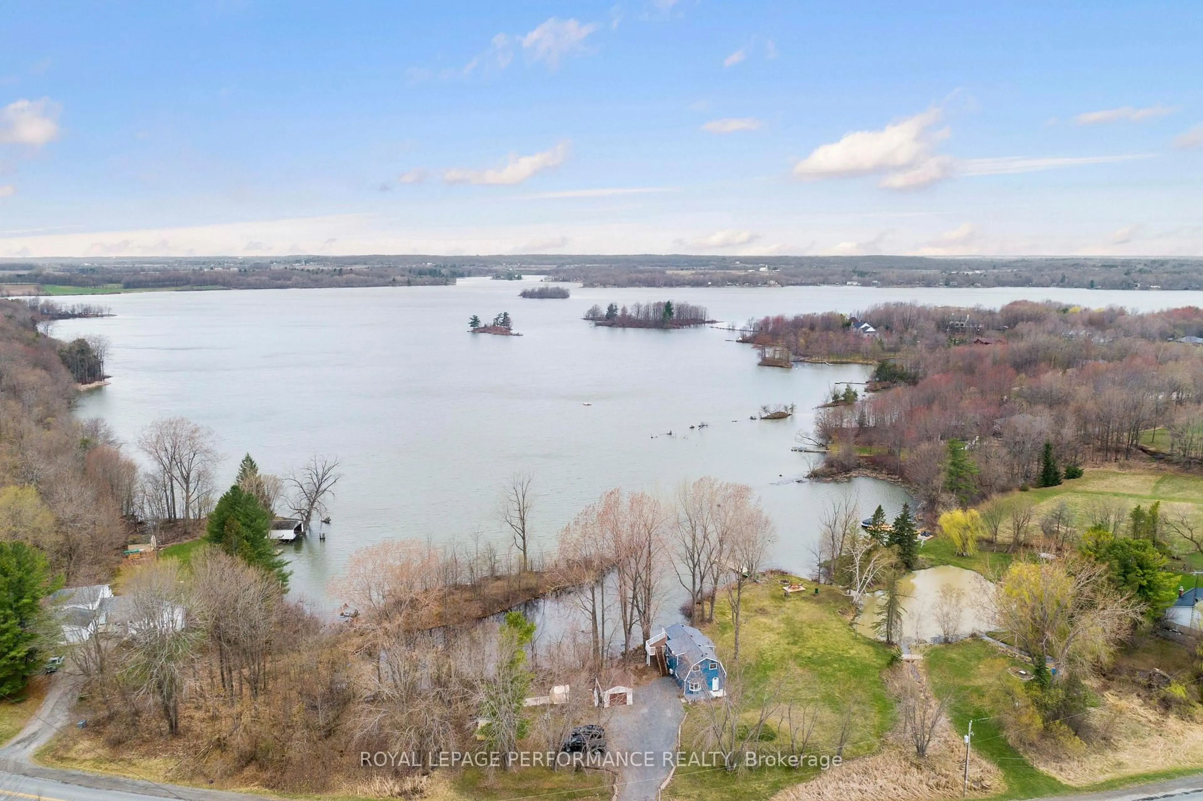A pic from outside/outdoor area/front of a property/back of a property/a pic from drone, water/lake/river/ocean view for 1930 Sunbury Rd, Inverary Ontario K0H 1X0