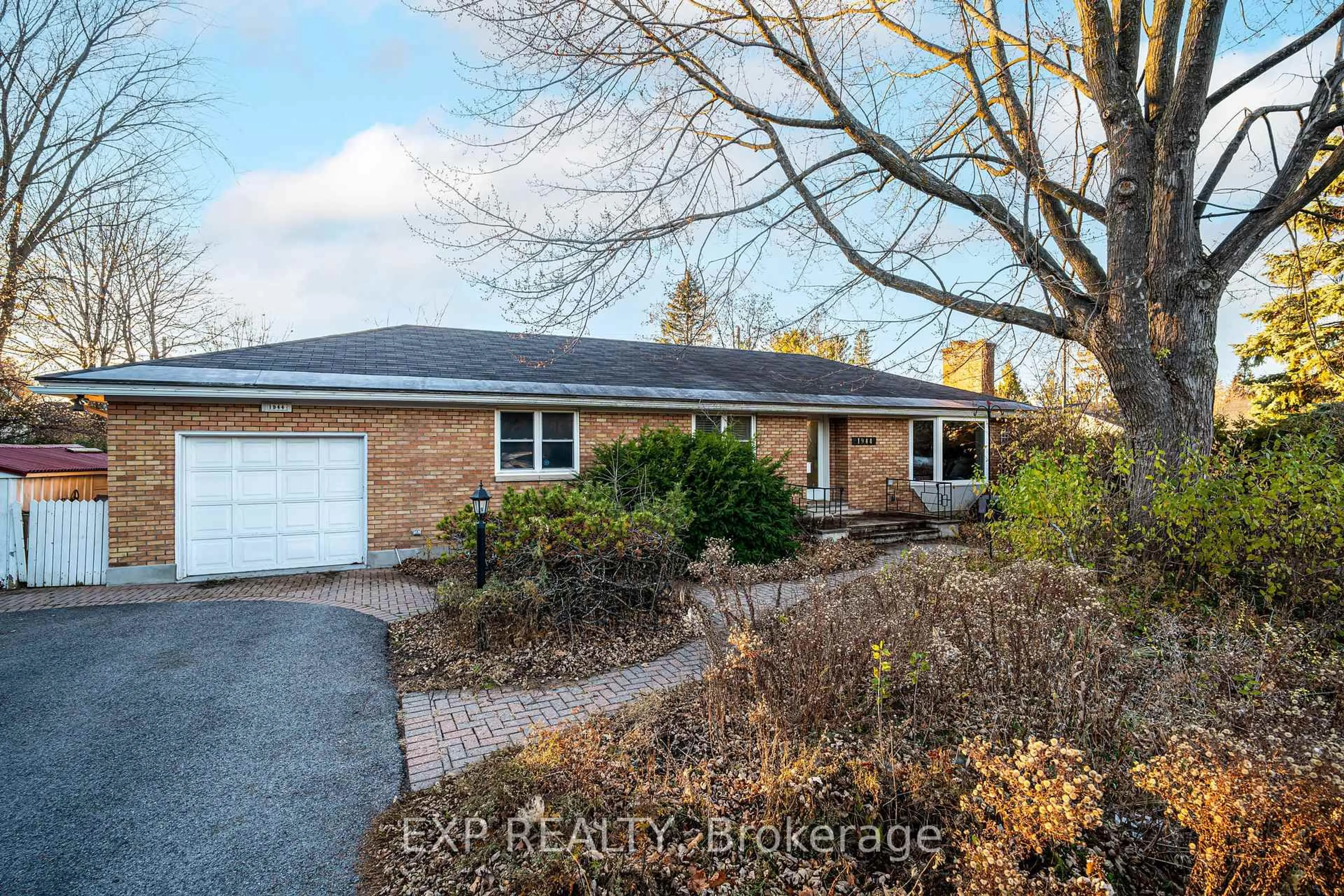 Home with brick exterior material, street for 1944 Ronald Ave, Ottawa Ontario K1H 5H9