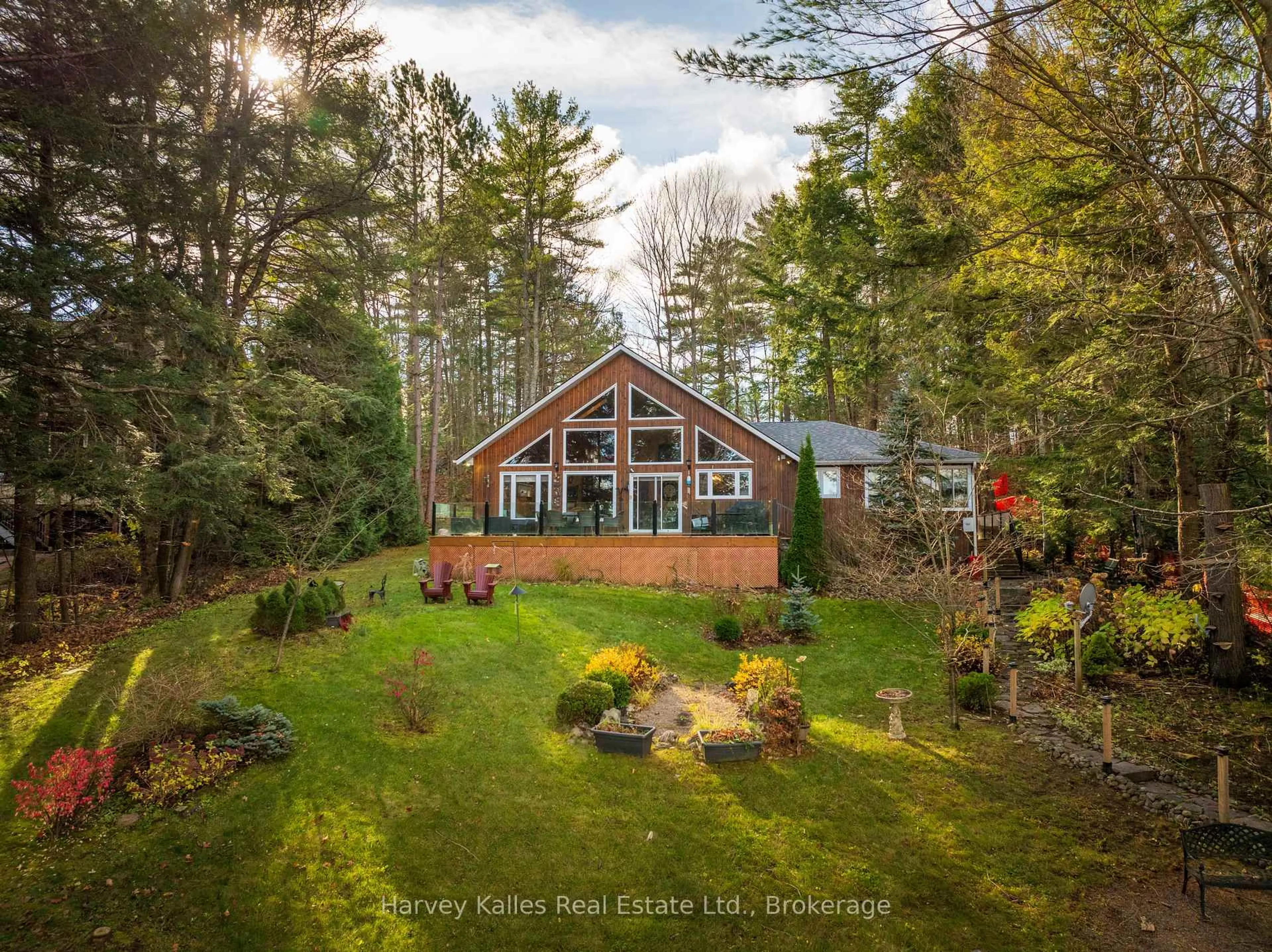 A pic from outside/outdoor area/front of a property/back of a property/a pic from drone, water/lake/river/ocean view for 1163 Parkers Point Rd, Gravenhurst Ontario P1P 1R2