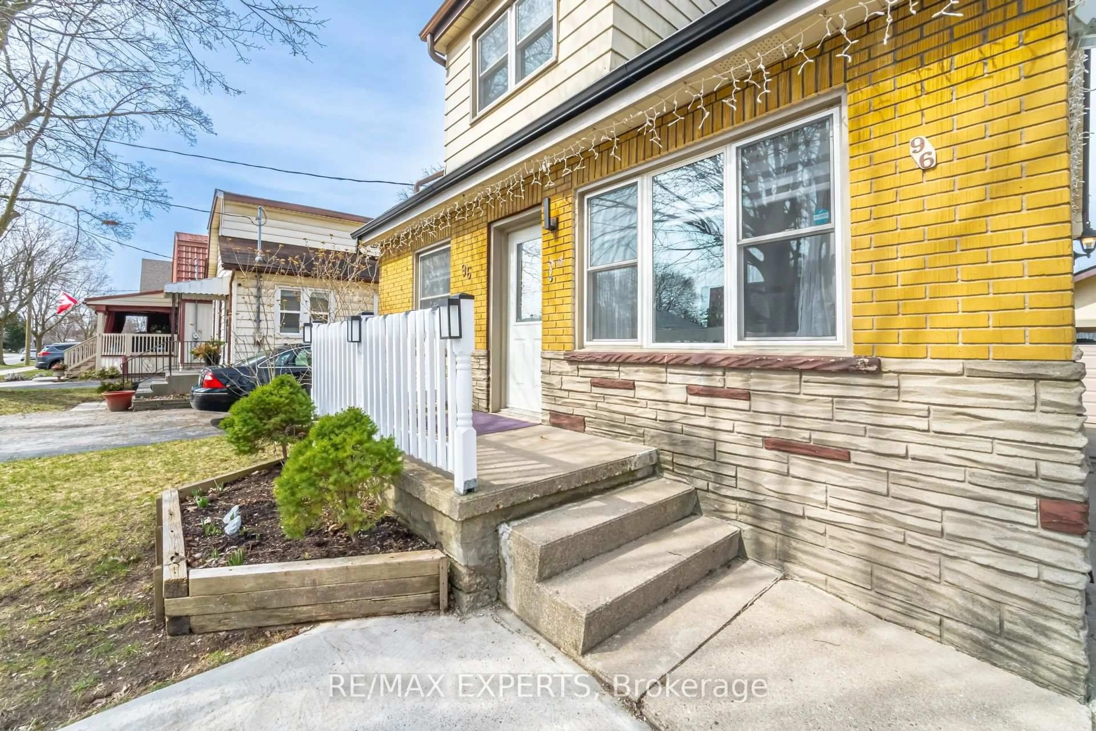 Home with brick exterior material, street for 96 Sixth Ave, Kitchener Ontario N2C 1R1