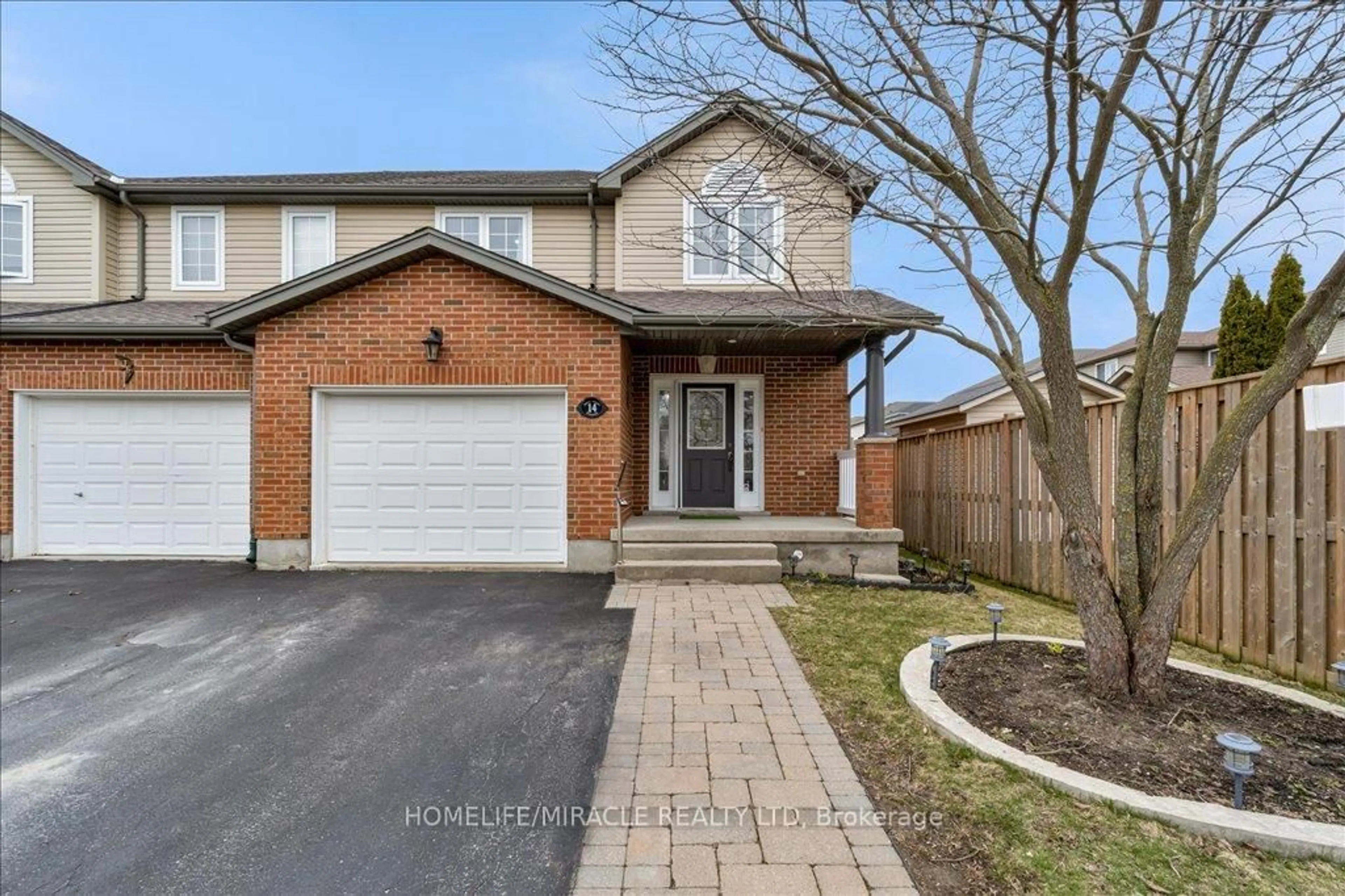 Home with brick exterior material, street for 14 Snow Goose Cres, Woolwich Ontario N3B 3M4