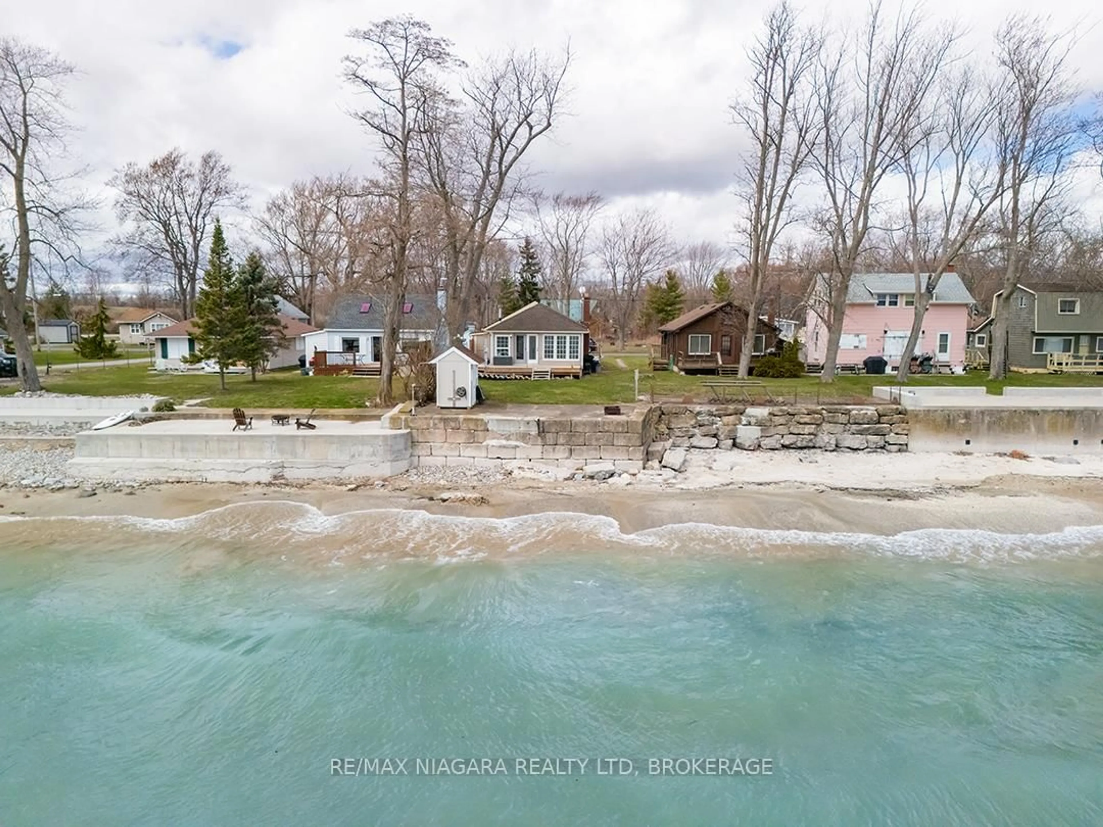 A pic from outside/outdoor area/front of a property/back of a property/a pic from drone, water/lake/river/ocean view for 11161 Churchill Ave, Wainfleet Ontario L0S 1V0