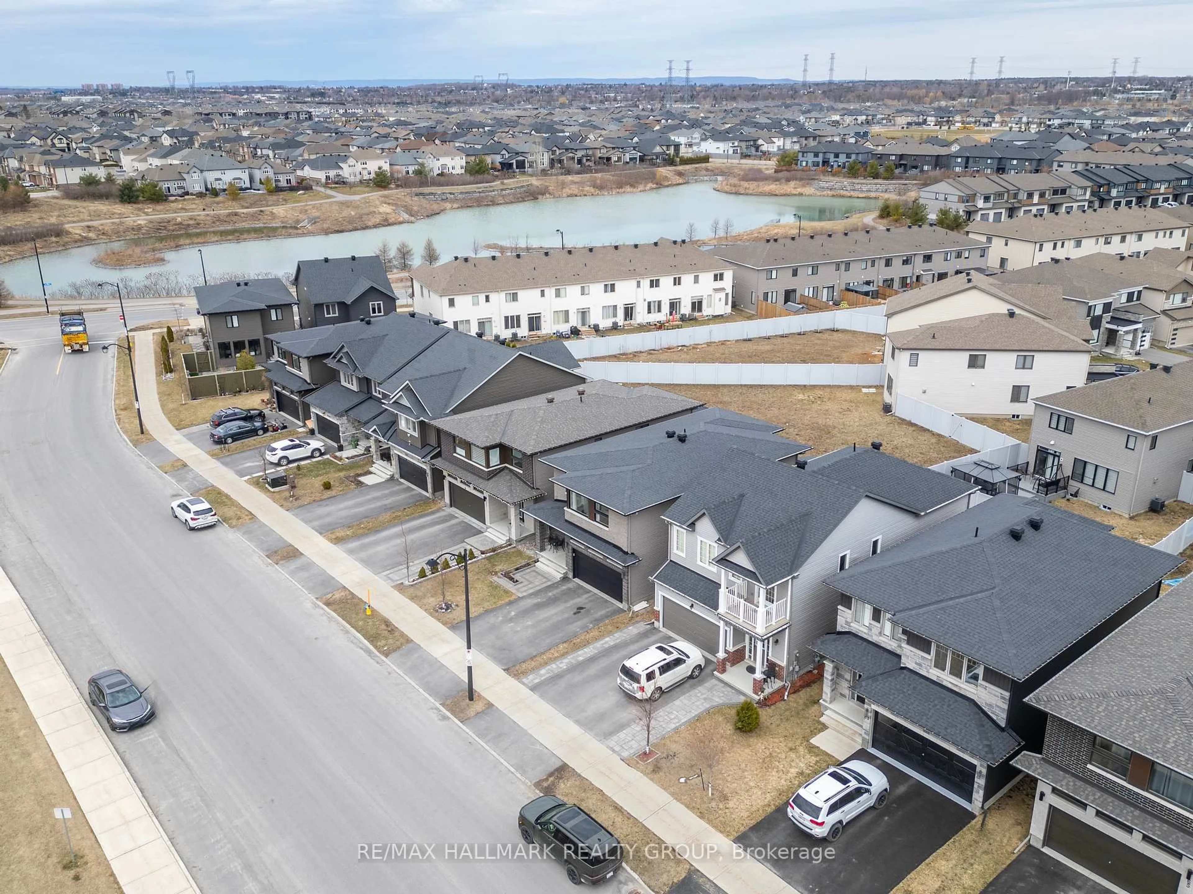 A pic from outside/outdoor area/front of a property/back of a property/a pic from drone, water/lake/river/ocean view for 59 Defence St, Ottawa Ontario K2V 0N3
