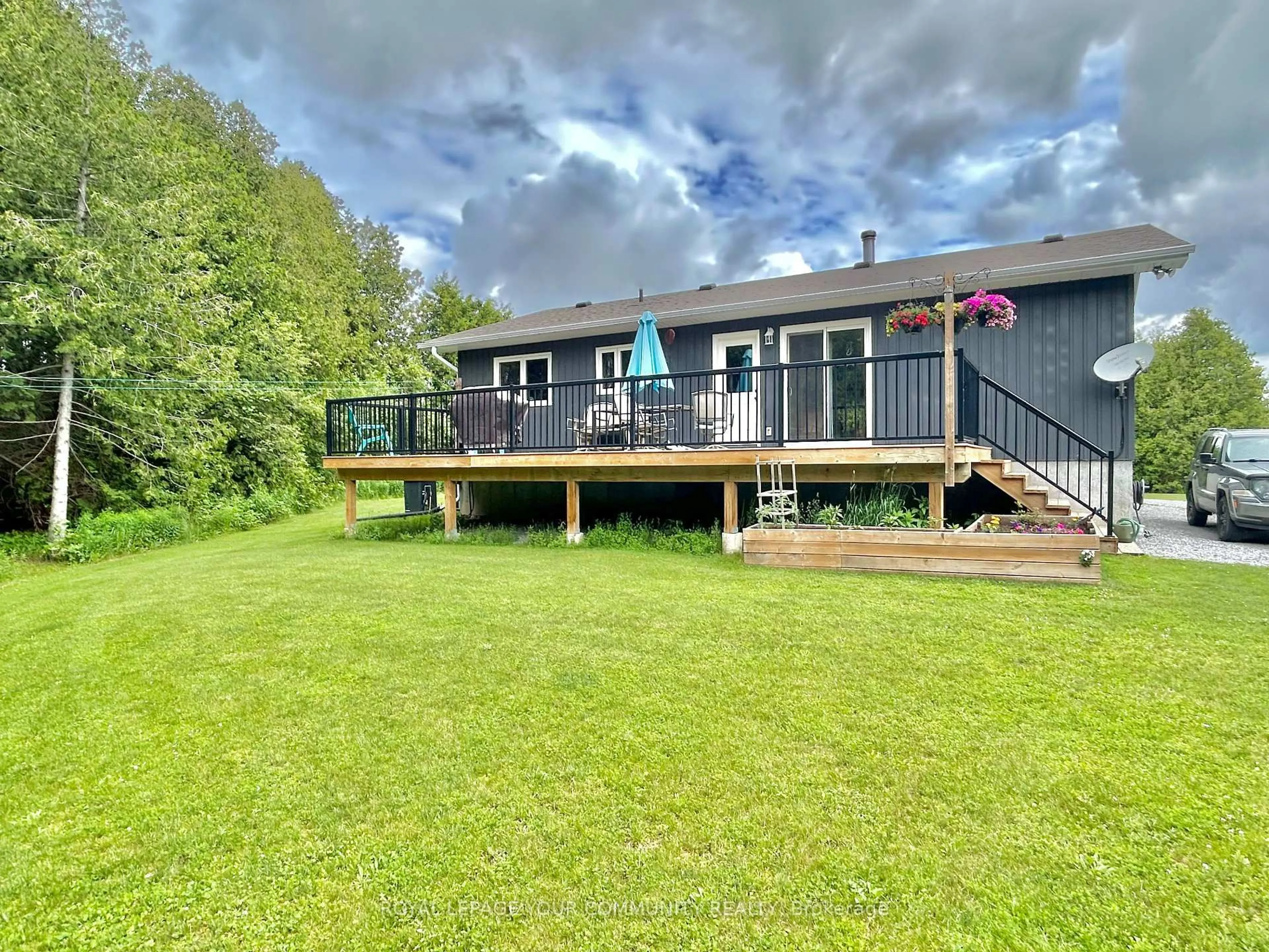 A pic from outside/outdoor area/front of a property/back of a property/a pic from drone, water/lake/river/ocean view for 2236 County 36 Rd, Kawartha Lakes Ontario K0M 1L0
