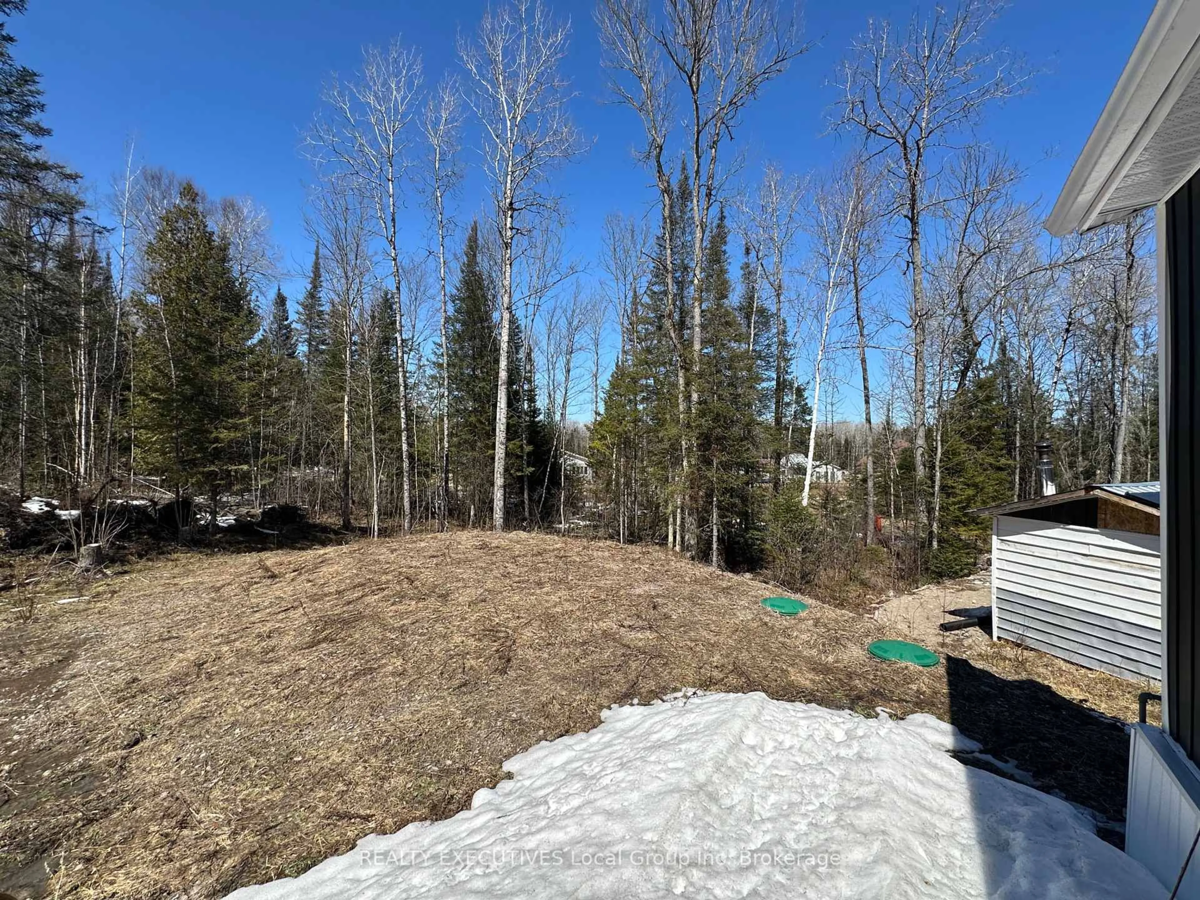 A pic from outside/outdoor area/front of a property/back of a property/a pic from drone, forest/trees view for 1348 Peddlers Dr, Calvin Ontario P0H 1V0