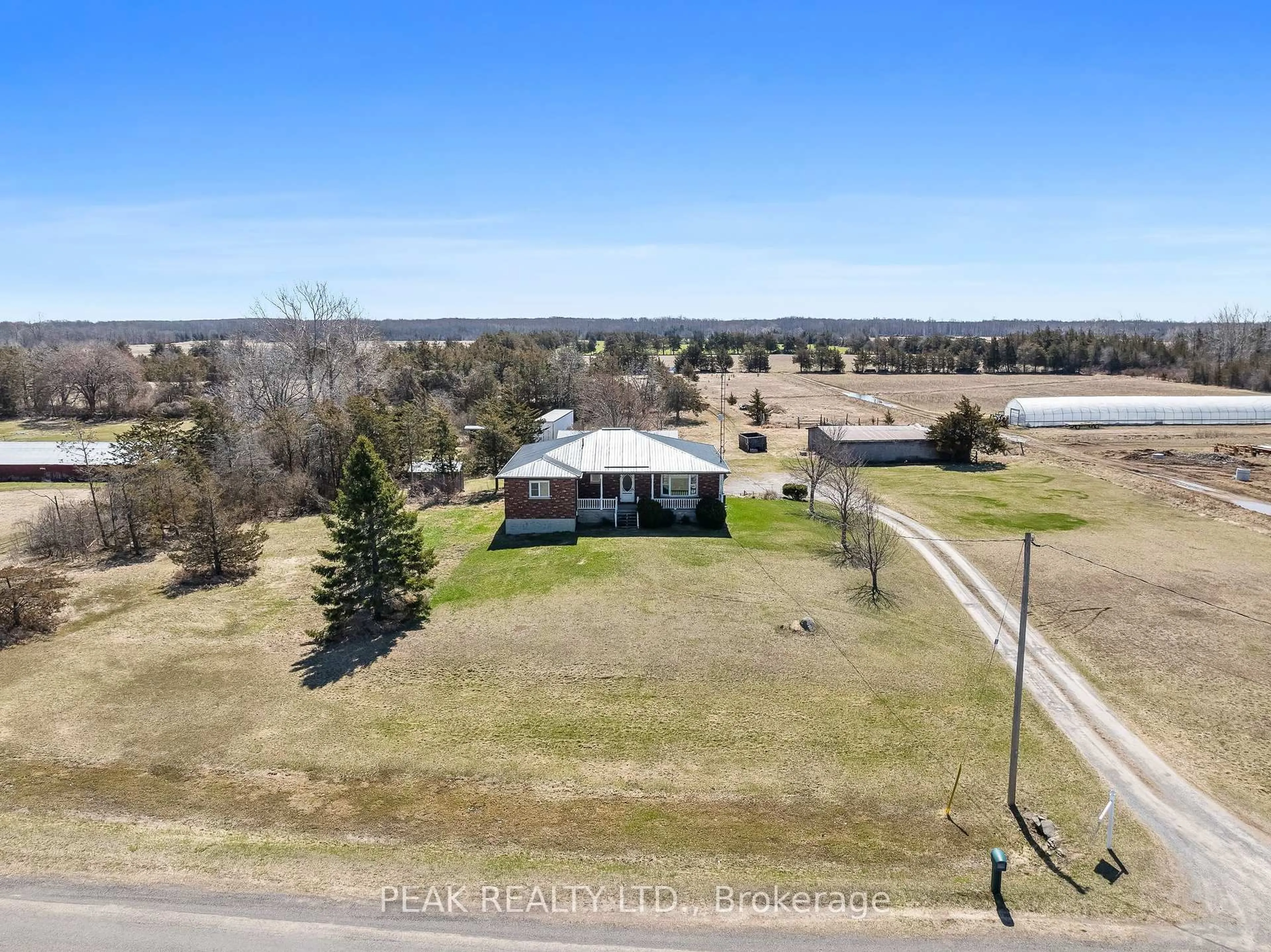 A pic from outside/outdoor area/front of a property/back of a property/a pic from drone, water/lake/river/ocean view for 1958 County Rd 7 Rd, Prince Edward County Ontario K0K 2T0