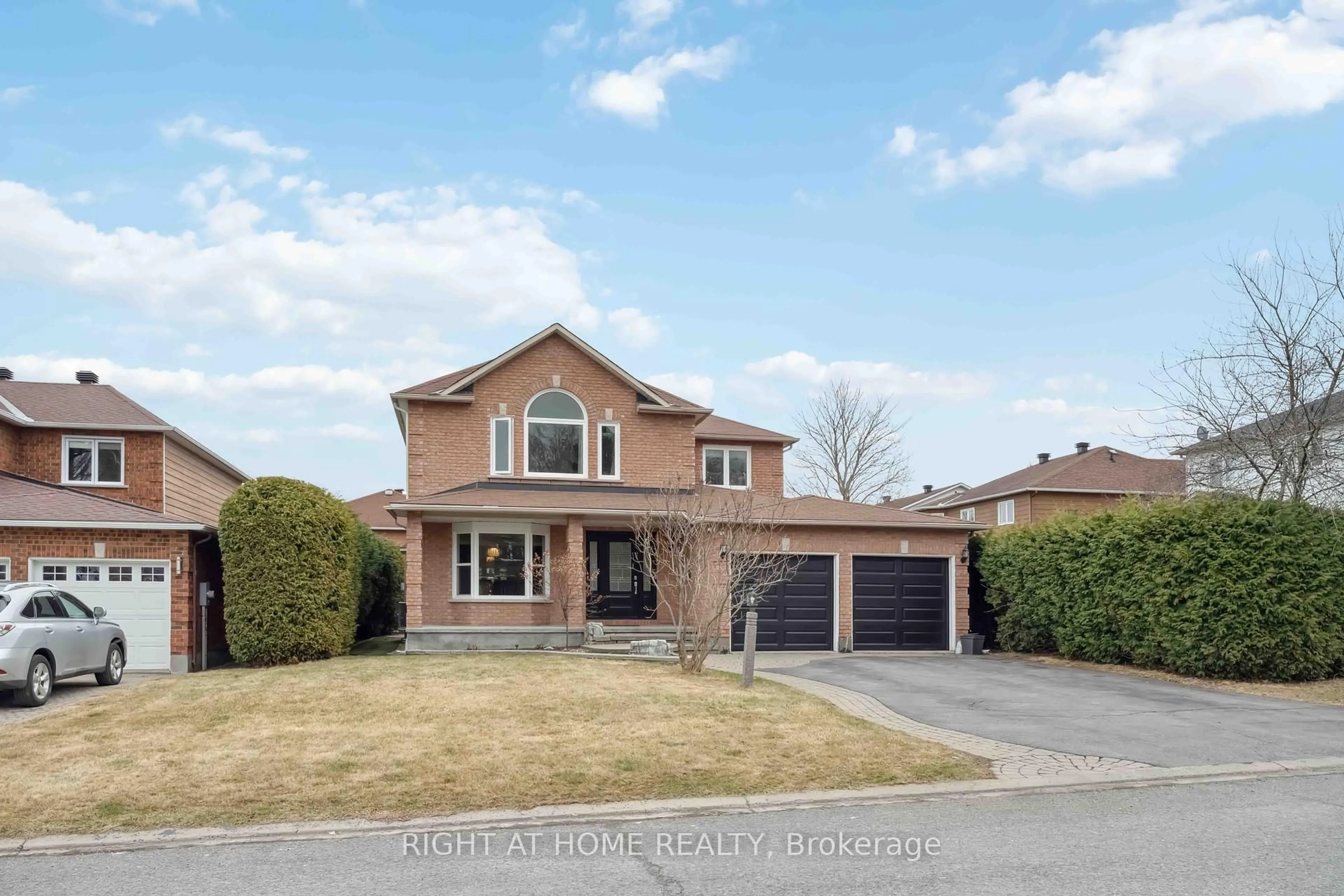 Home with brick exterior material, street for 54 Slade Cres, Ottawa Ontario K2K 2K8