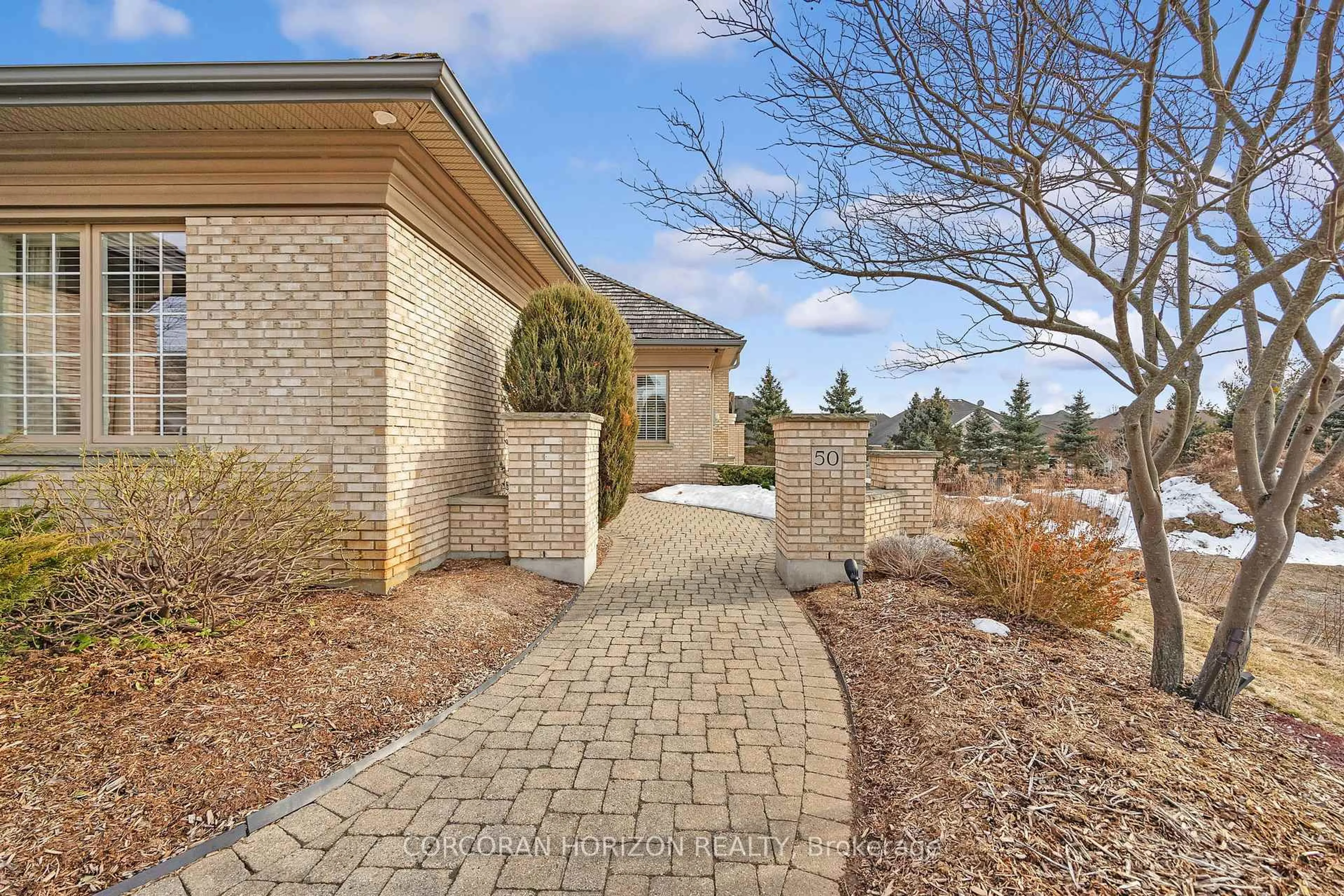 Home with brick exterior material, street for 260 Deer Ridge Dr #50, Kitchener Ontario N2P 2M3