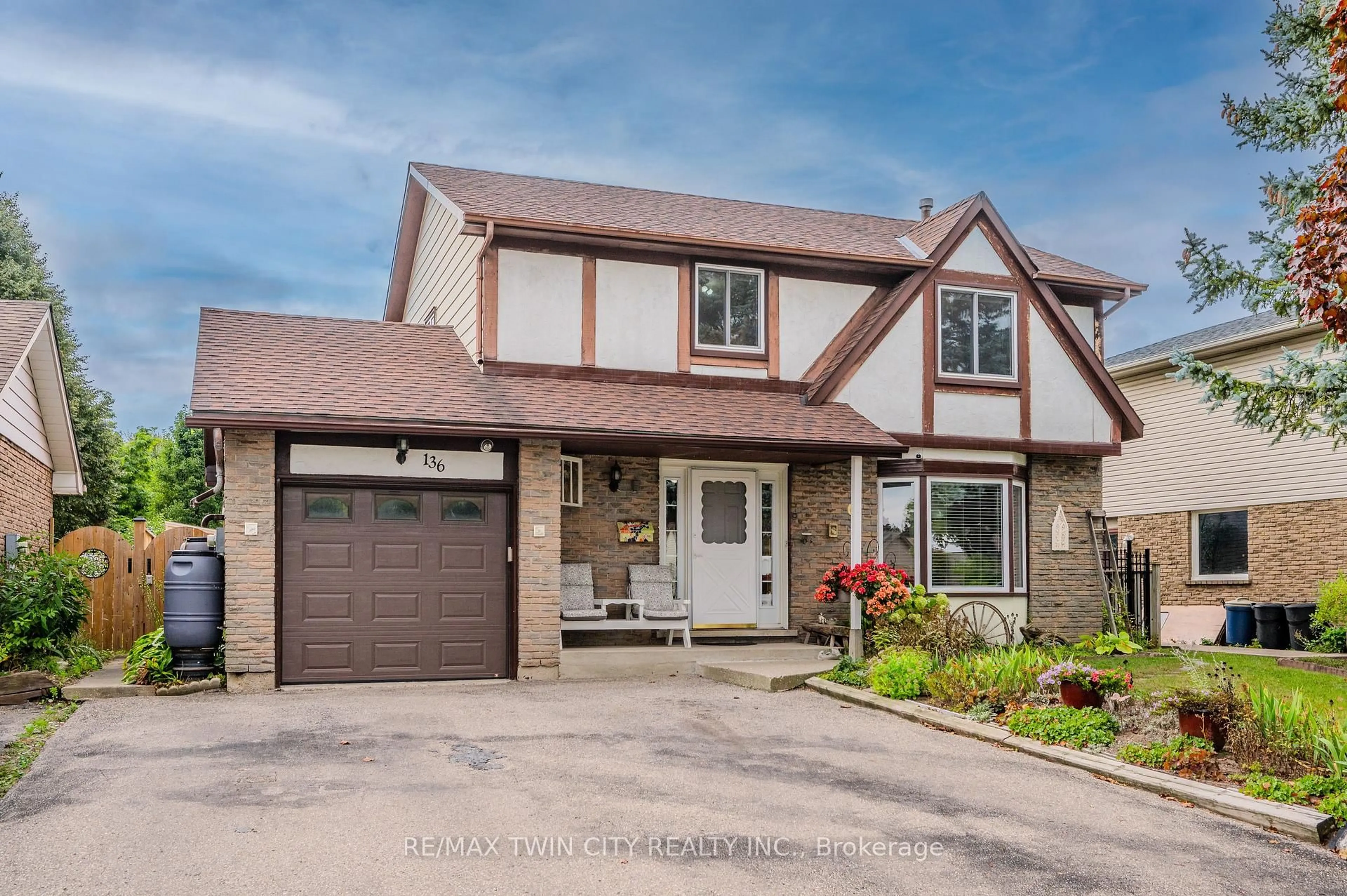 Home with brick exterior material, street for 136 St Jerome Cres, Kitchener Ontario N2C 2L2