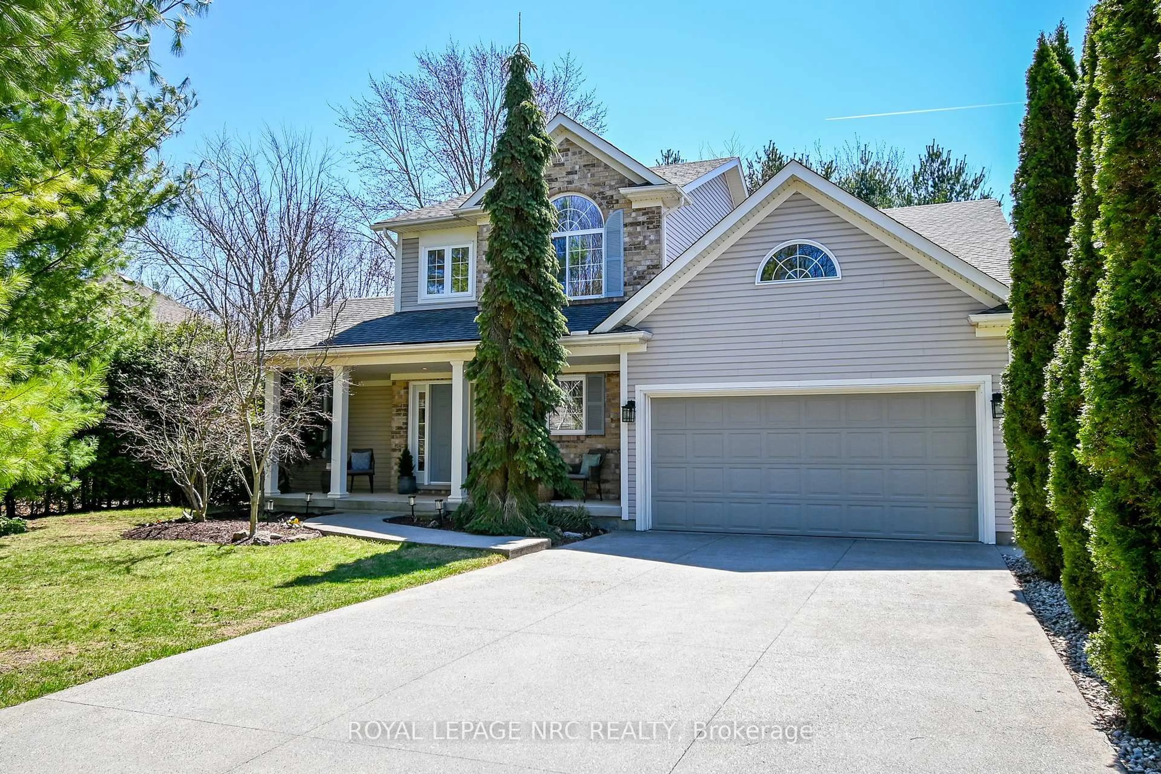 Home with vinyl exterior material, street for 14 Bacon Lane, Pelham Ontario L0S 1E4