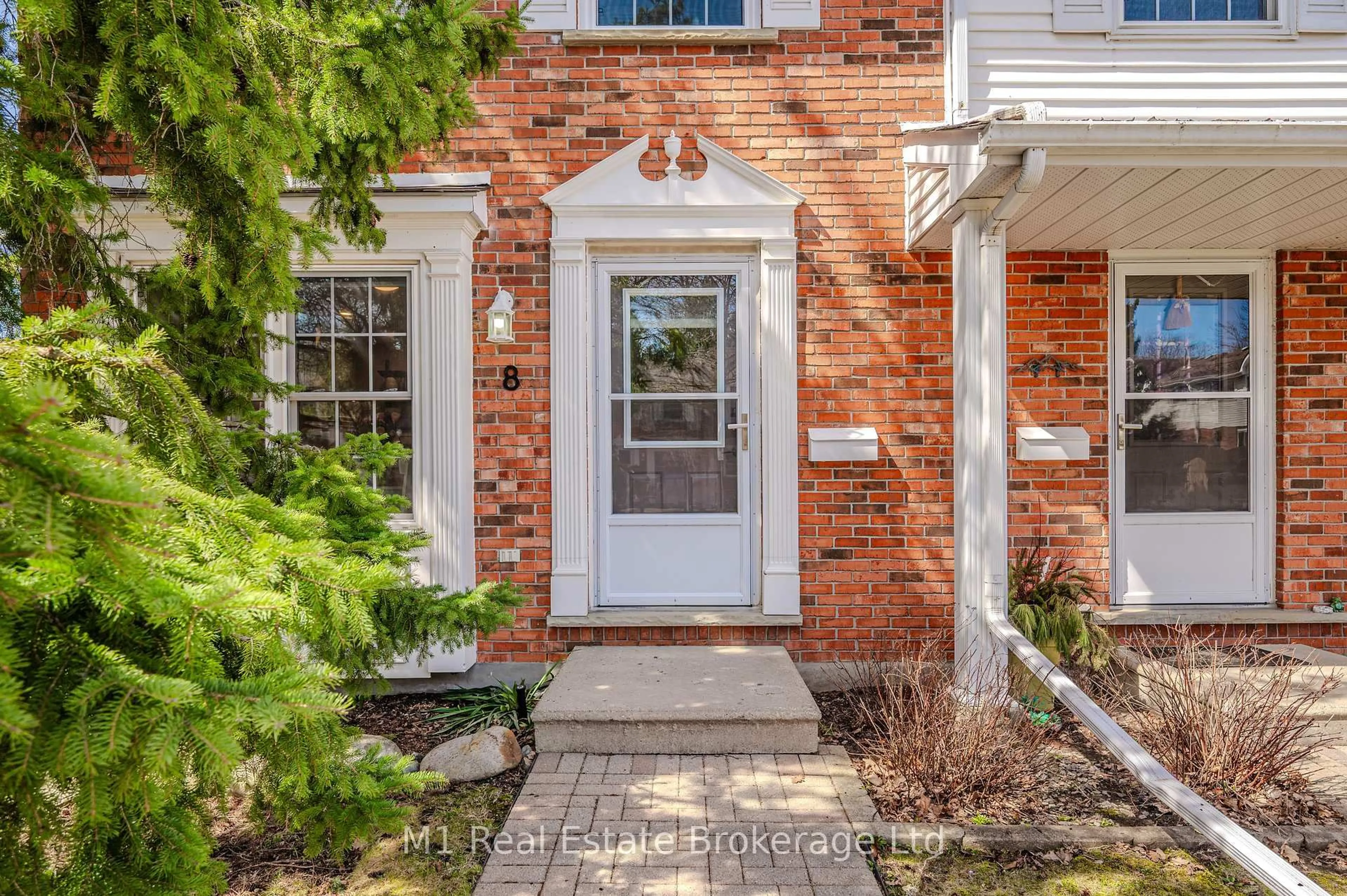 Home with brick exterior material, street for 129 VICTORIA Rd #8, Guelph Ontario N1E 6V3