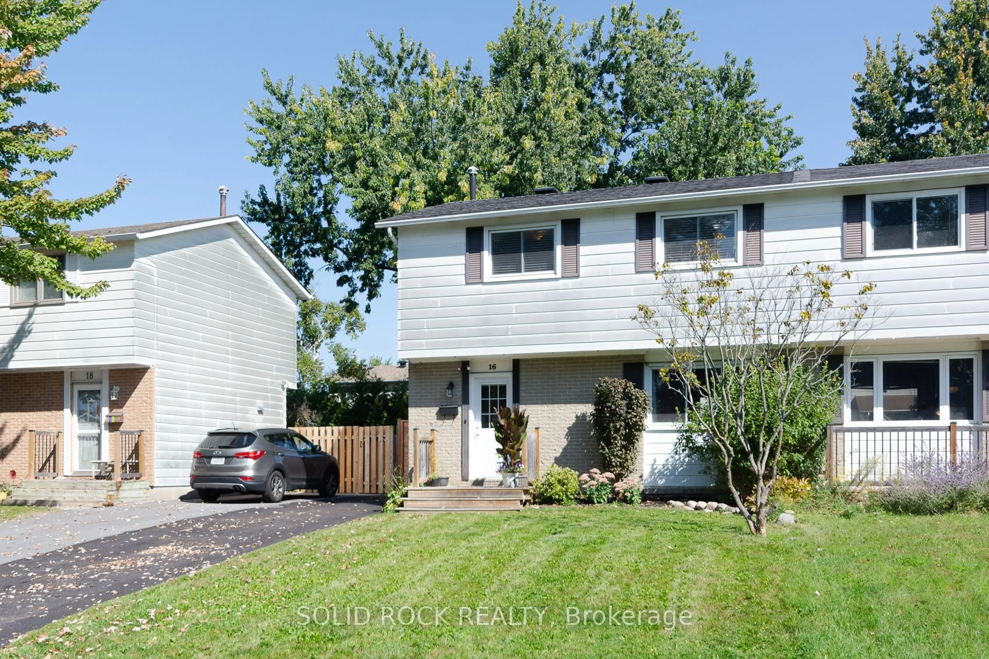 Home with vinyl exterior material, street for 16 Shouldice Cres, Ottawa Ontario K2L 1M9
