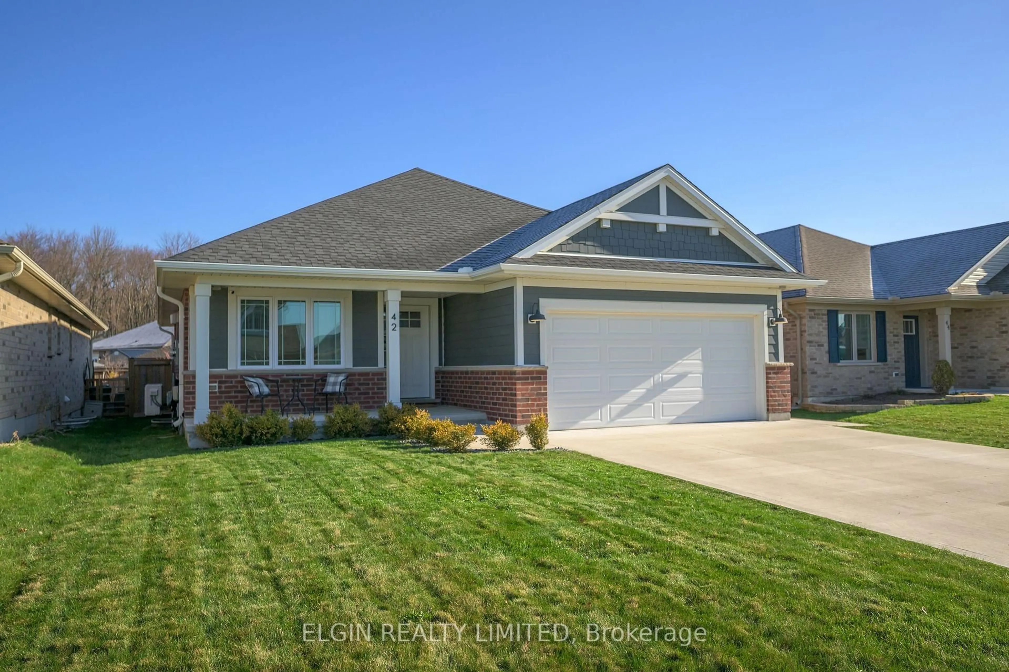 Home with brick exterior material, street for 42 Foxtail Lane, St. Thomas Ontario N5R 0J3
