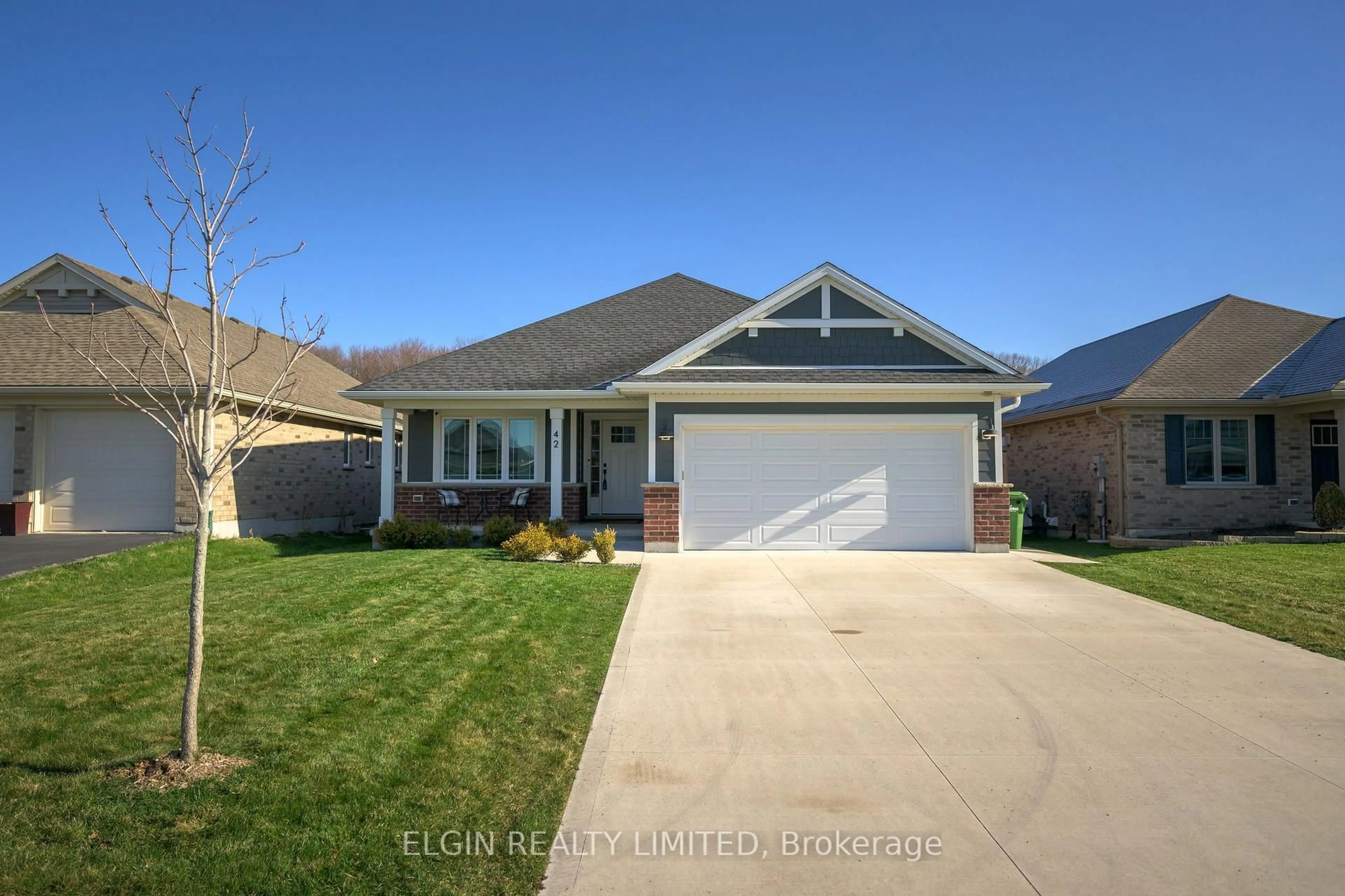Home with brick exterior material, street for 42 Foxtail Lane, St. Thomas Ontario N5R 0J3