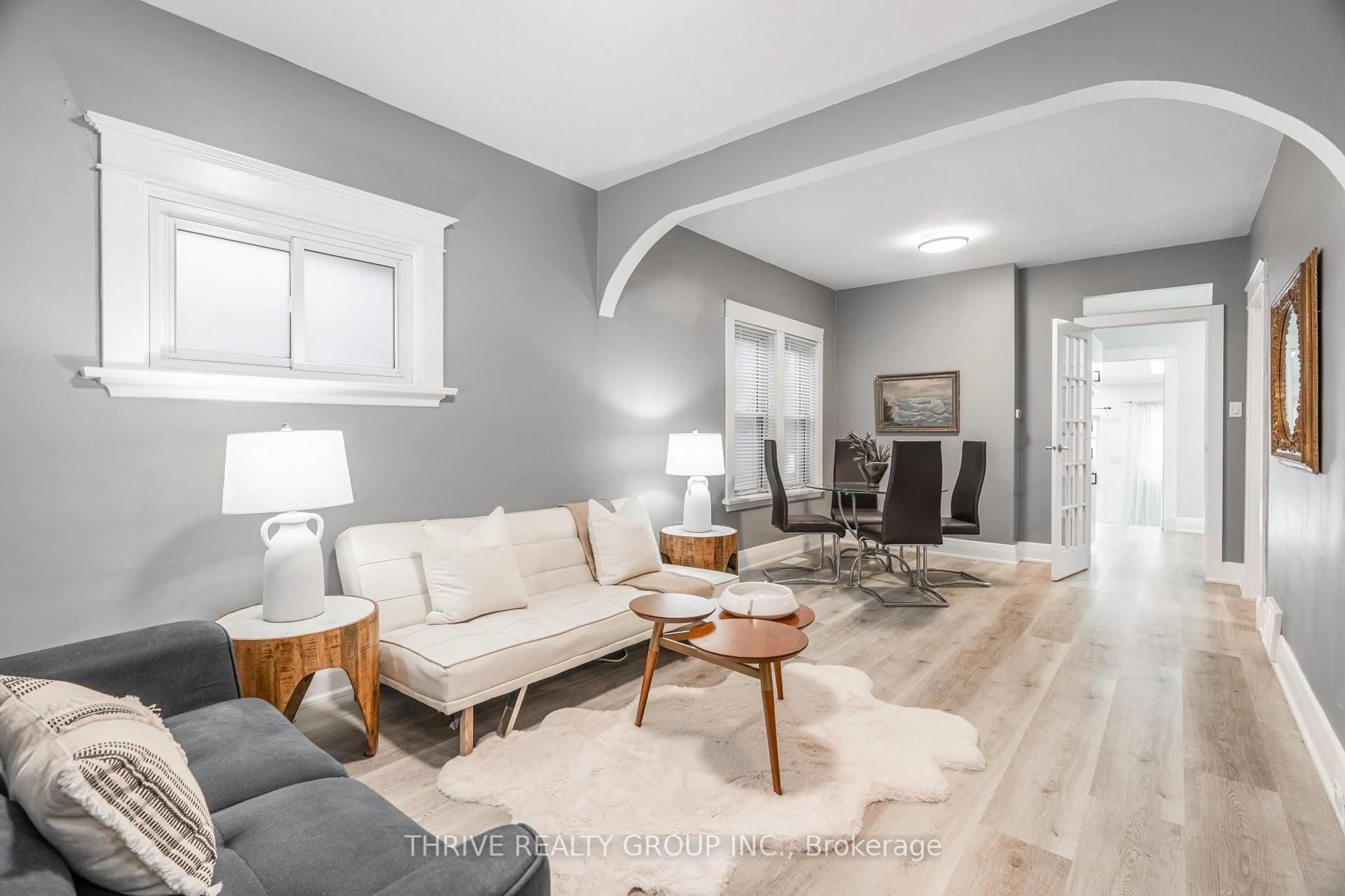 Living room with furniture, wood/laminate floor for 65 Beattie Ave, London East Ontario N5W 2P1