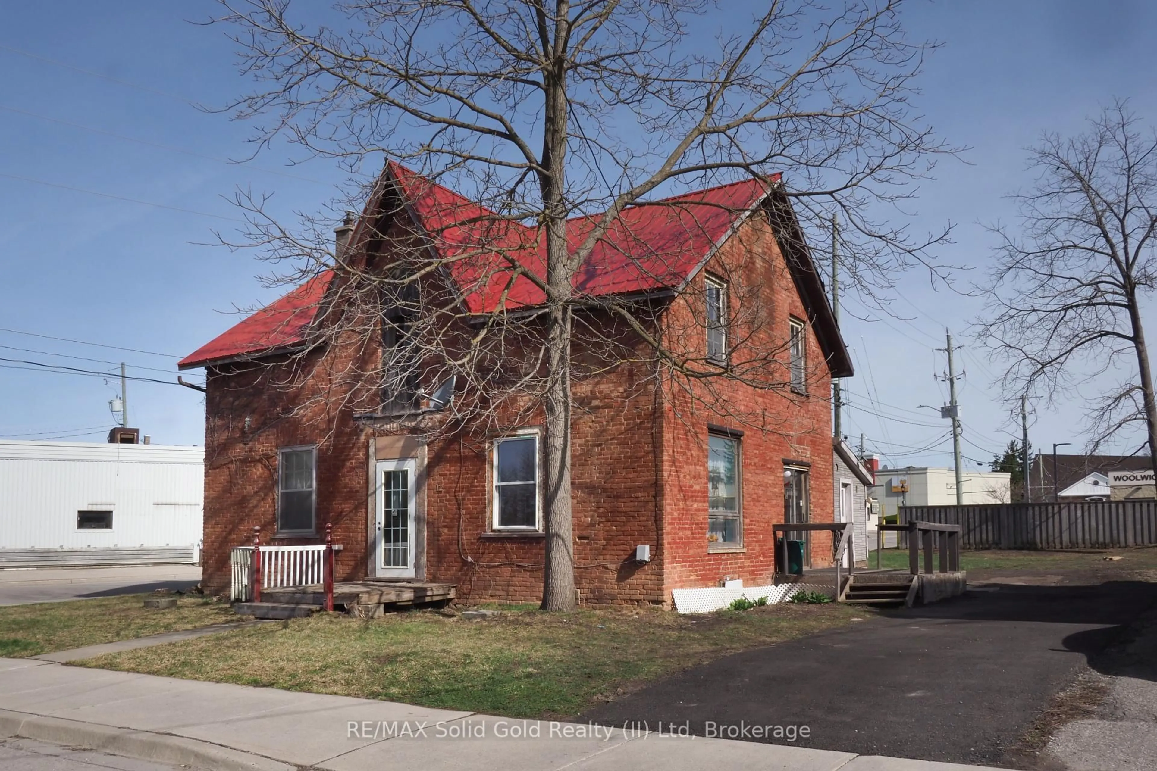 Home with brick exterior material, street for 12 Mill St, Woolwich Ontario N3B 2K2