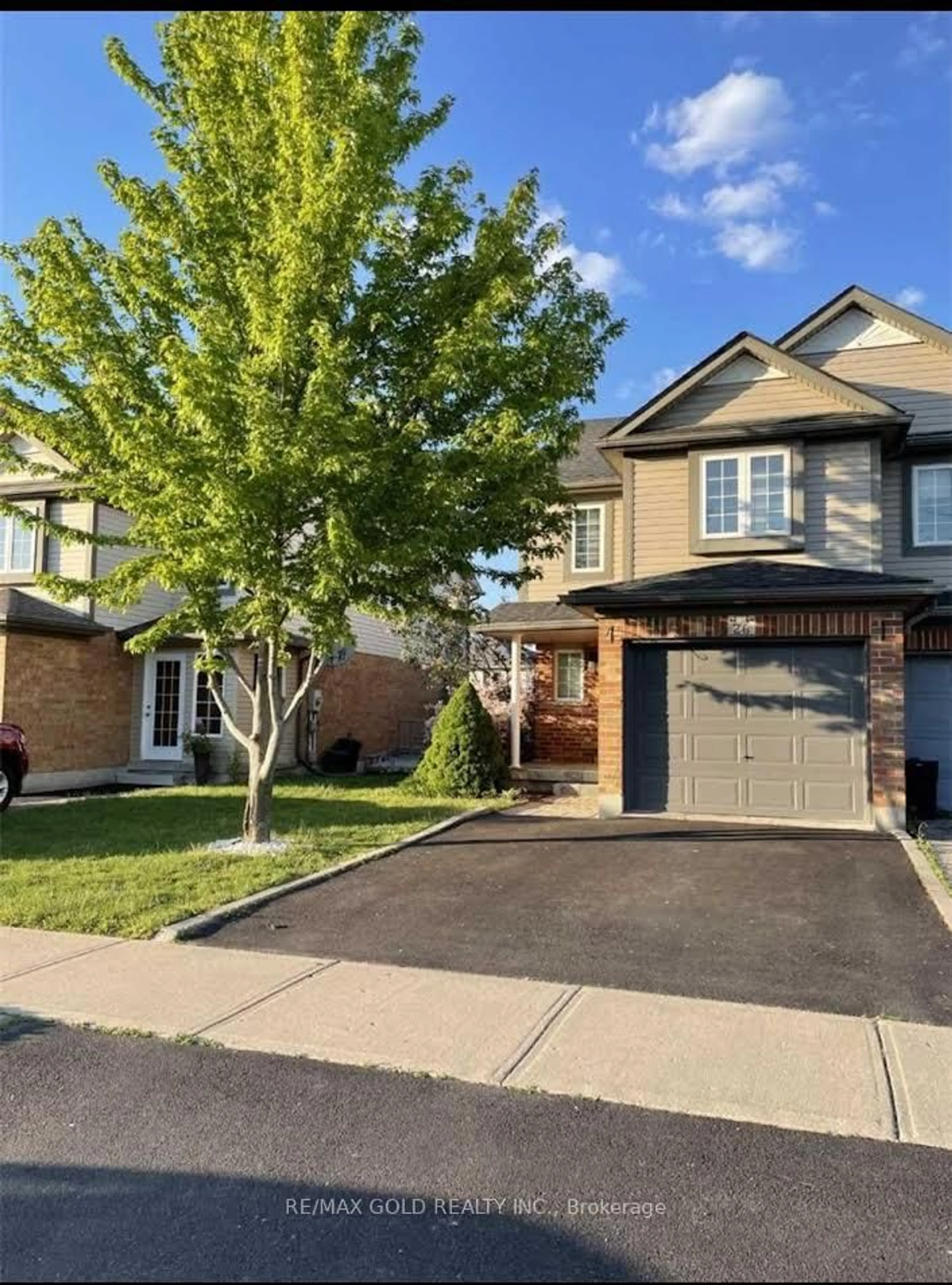 Home with brick exterior material, street for 26 Max Becker Dr, Kitchener Ontario N2E 3V7