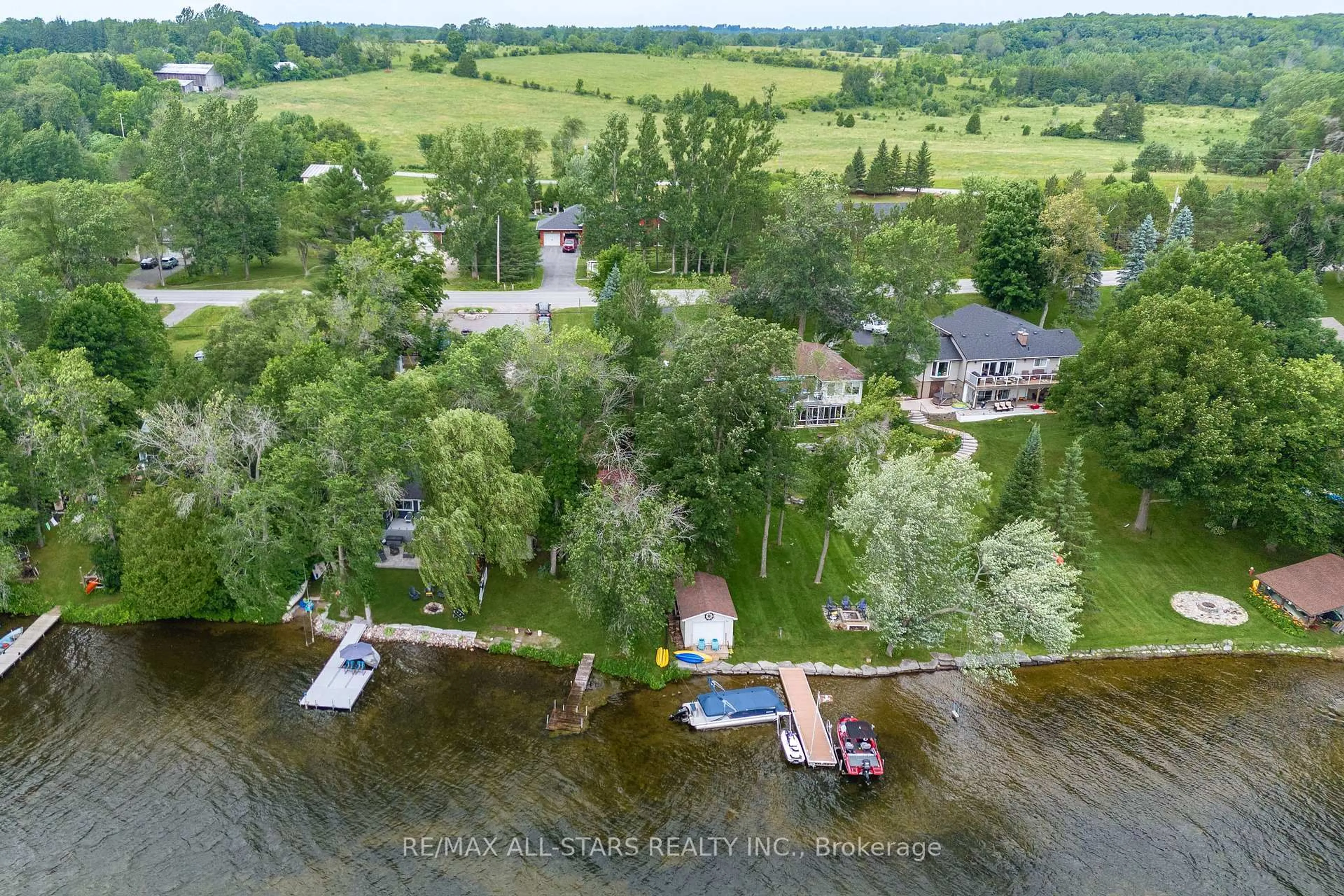 A pic from outside/outdoor area/front of a property/back of a property/a pic from drone, water/lake/river/ocean view for 1861 Young's Point Rd, Selwyn Ontario K0L 2H0