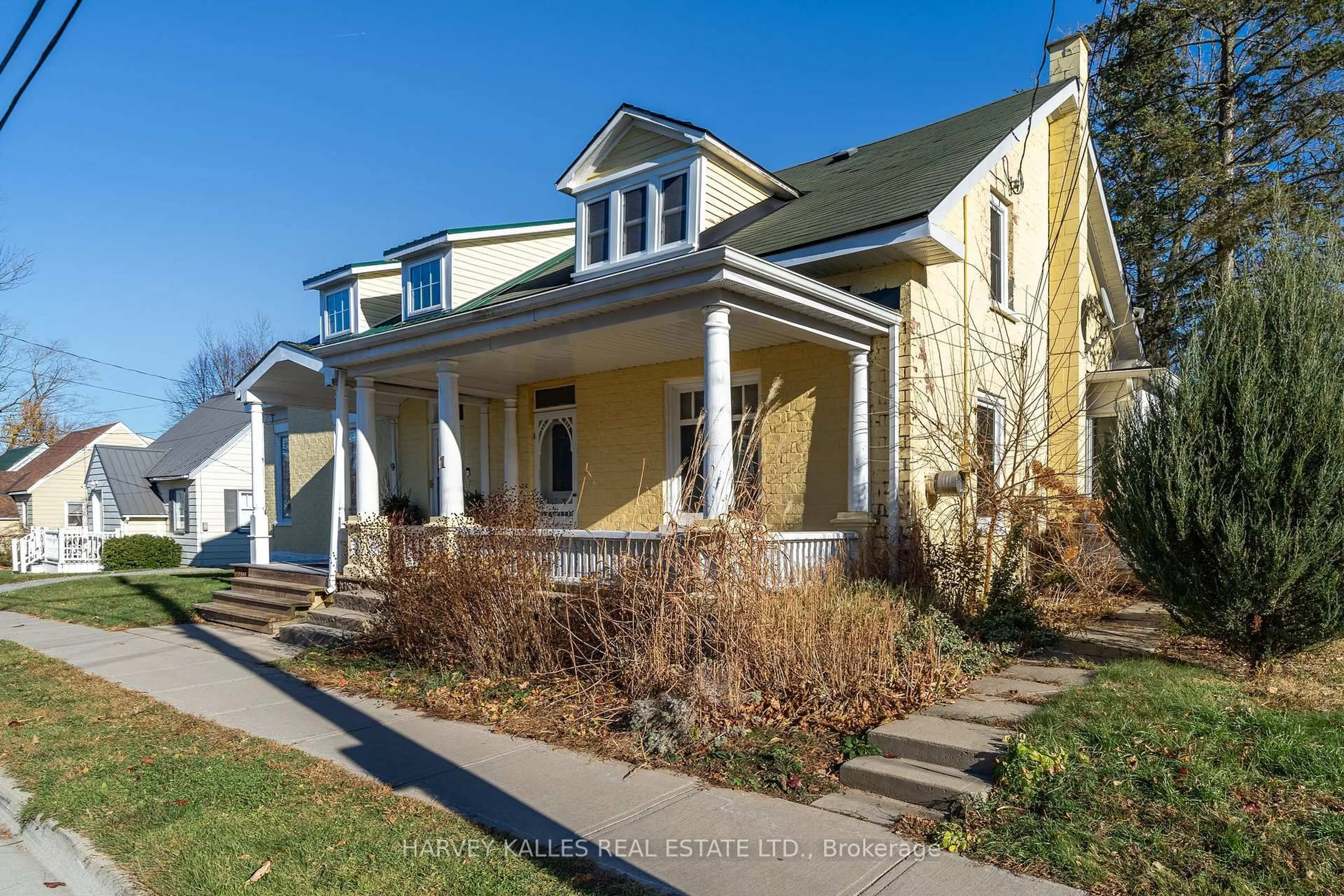 Home with vinyl exterior material, street for 11 Ferguson St, Prince Edward County Ontario K0K 2T0